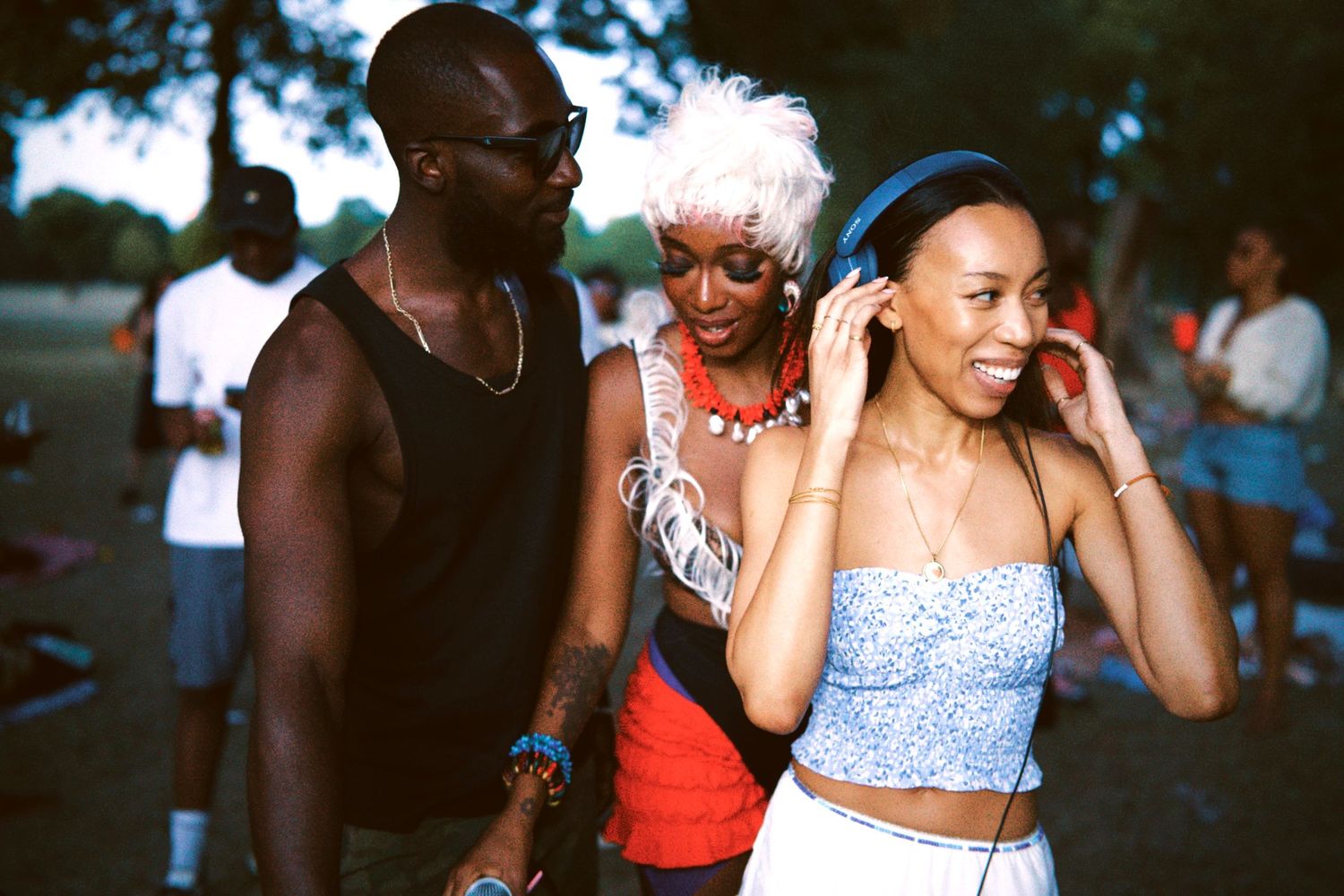 DJ YGMT, DJ House of Faces, DJ Rush hour. Friends enjoying music together at outdoor London event by ARIETA Studios.