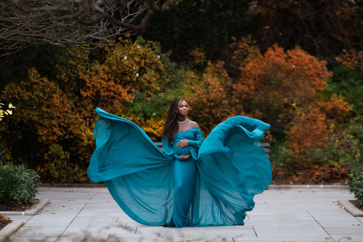 conservatory garden in fall autumn maternity and pregnancy photography by professional photographer in new york city