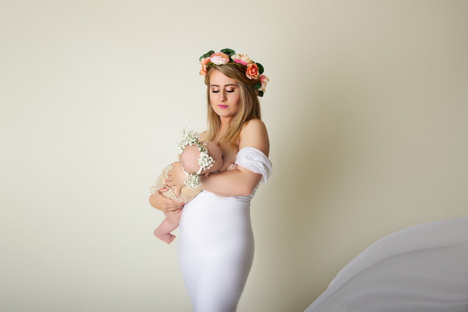 breastfeeding baby and mother during photo session
