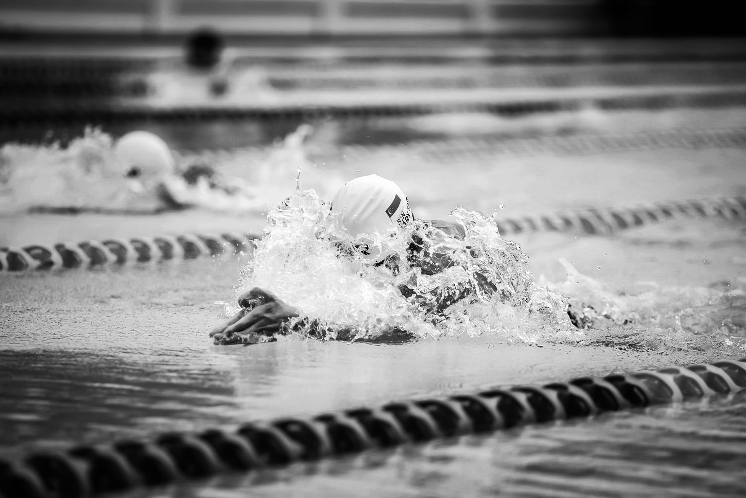 Sportifs - Evènement sportif - Natation - Compétition - Performance - Nageur - Piscine