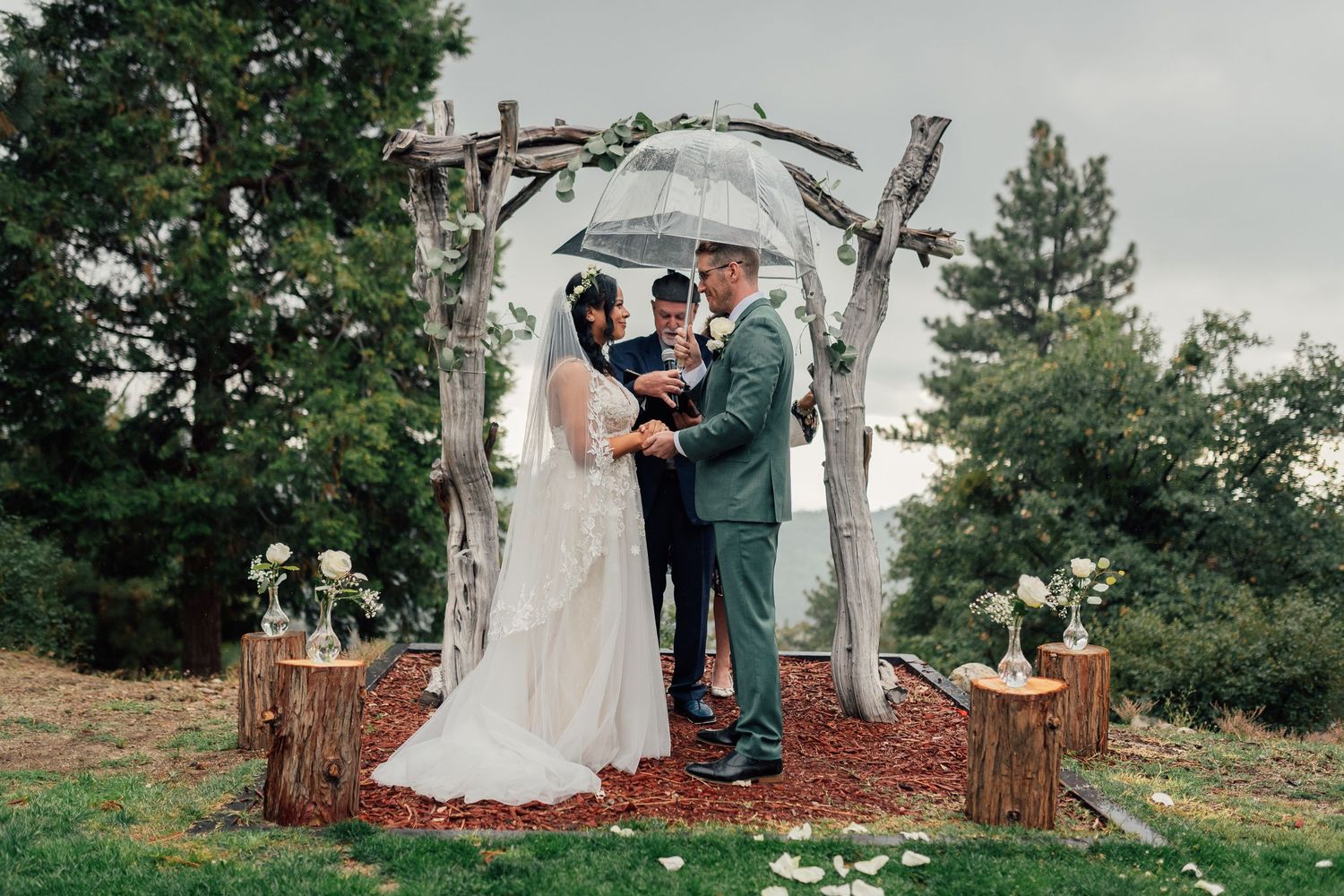 Idyllwild Elopements, nature ceremony, surrounded by nature, couple kissing in private mountain ceremony