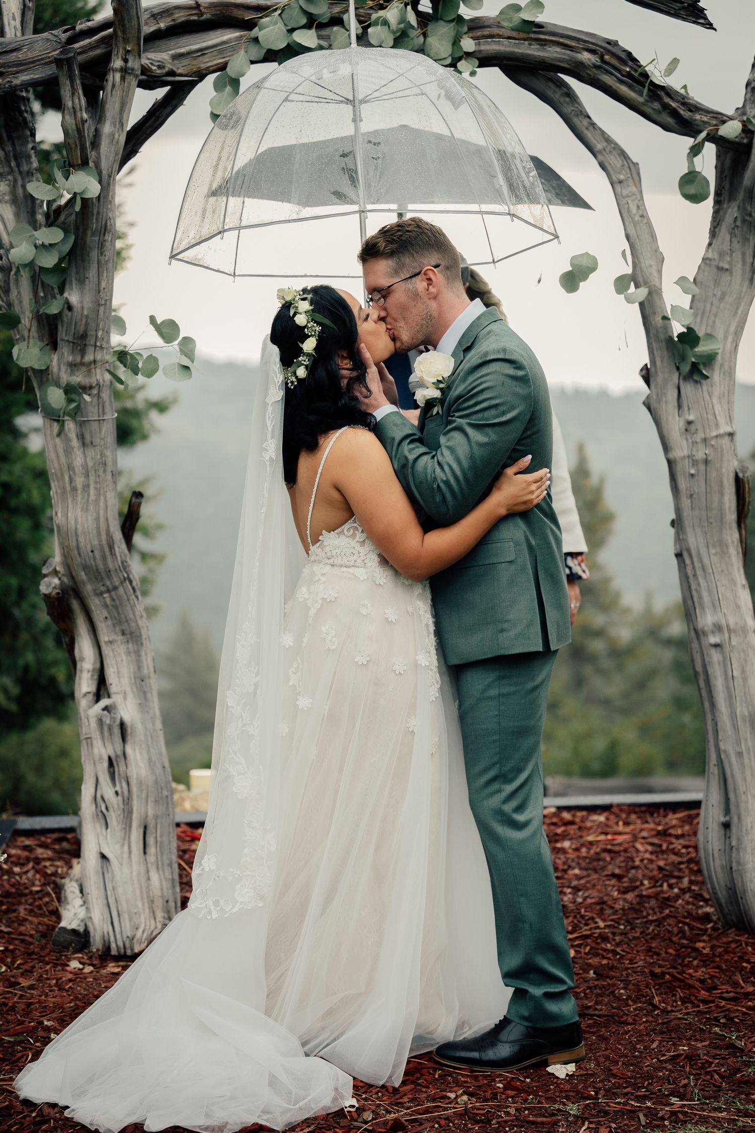 Idyllwild Elopements, nature ceremony, surrounded by nature, couple kissing in private mountain ceremony
