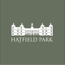 Hatfield Park logo with white detailed illustration of historic manor house on sage green background.