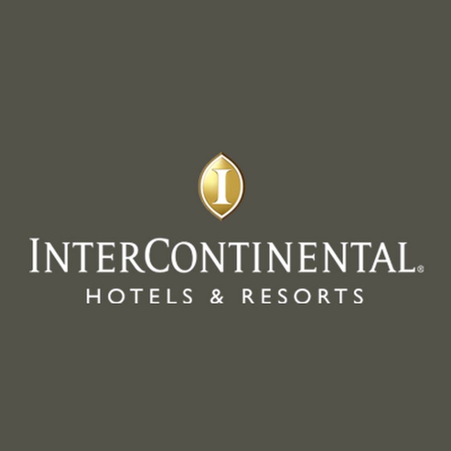 InterContinental Hotels and Resorts brand logo with iconic gold shield emblem on muted green background.