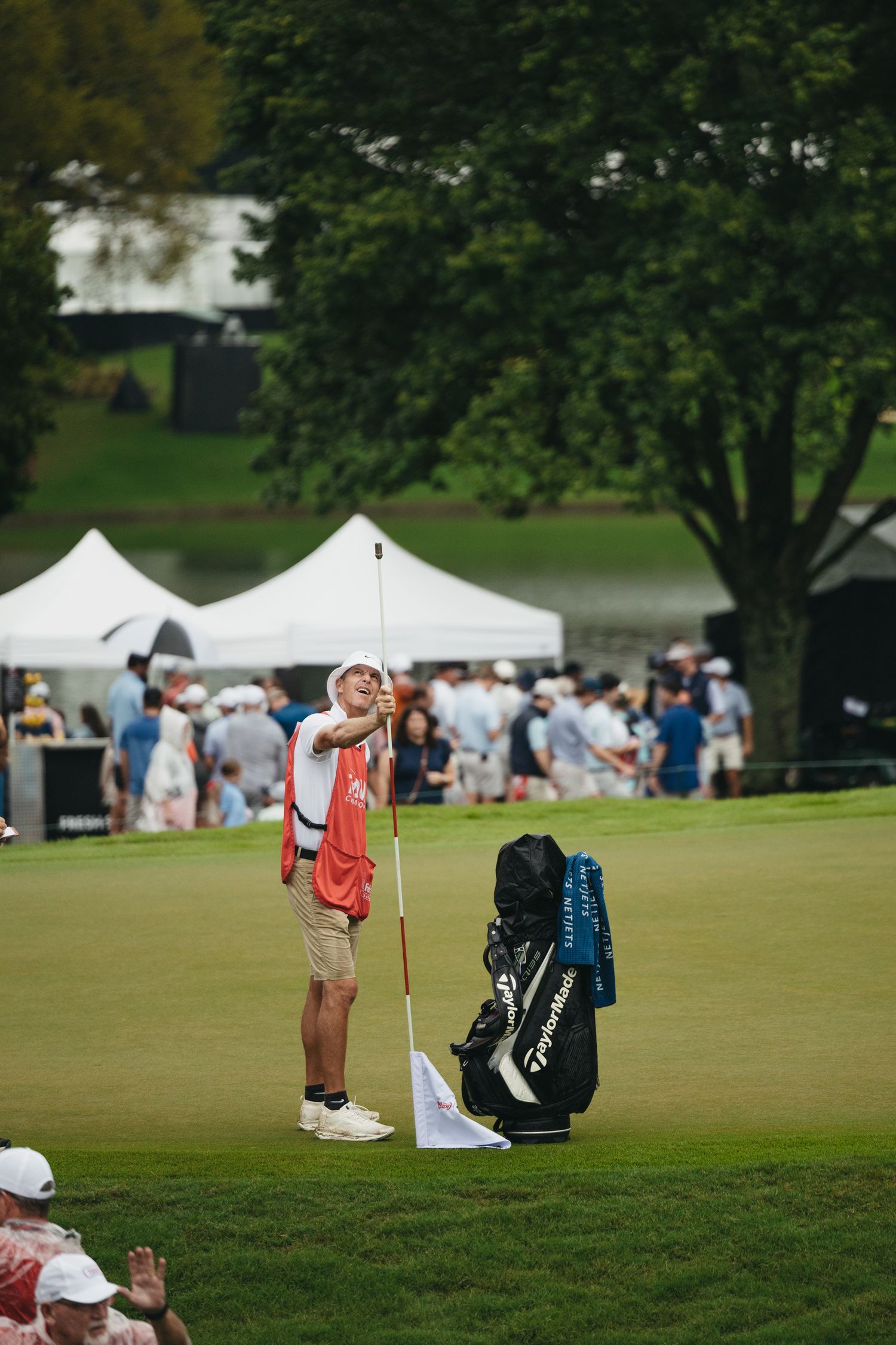 pga tour caddie at the pga tour championships professional golf photography