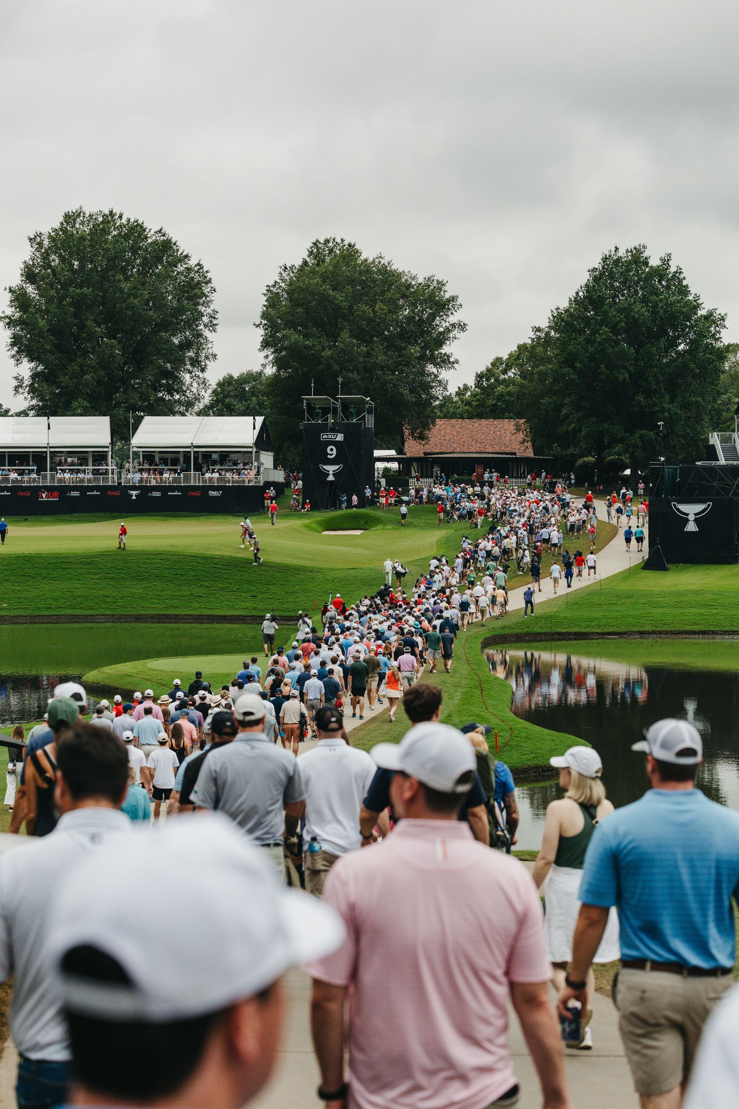 golfers walking through pga tour event