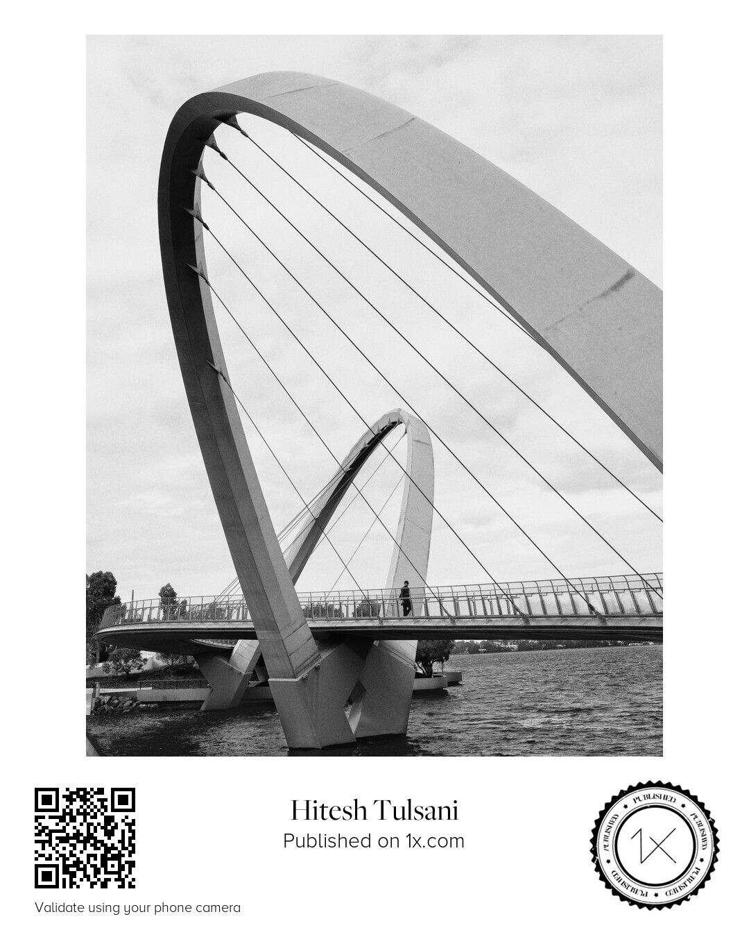 Lone Figure — black and white architectural photograph featuring a solitary figure beneath modern urban structures in Perth.