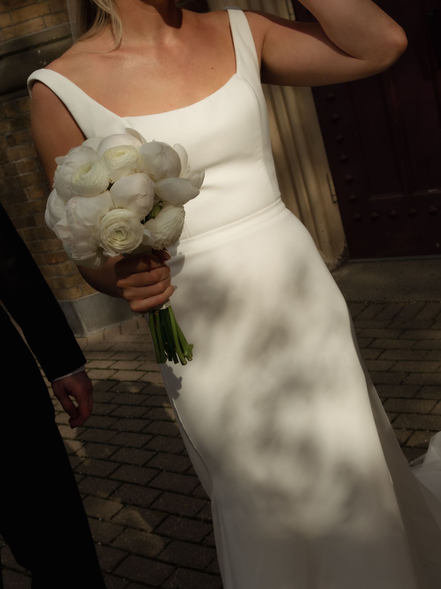 Toronto wedding photographed on 35mm film, capturing an intimate candid moment with a nostalgic, timeless feel.