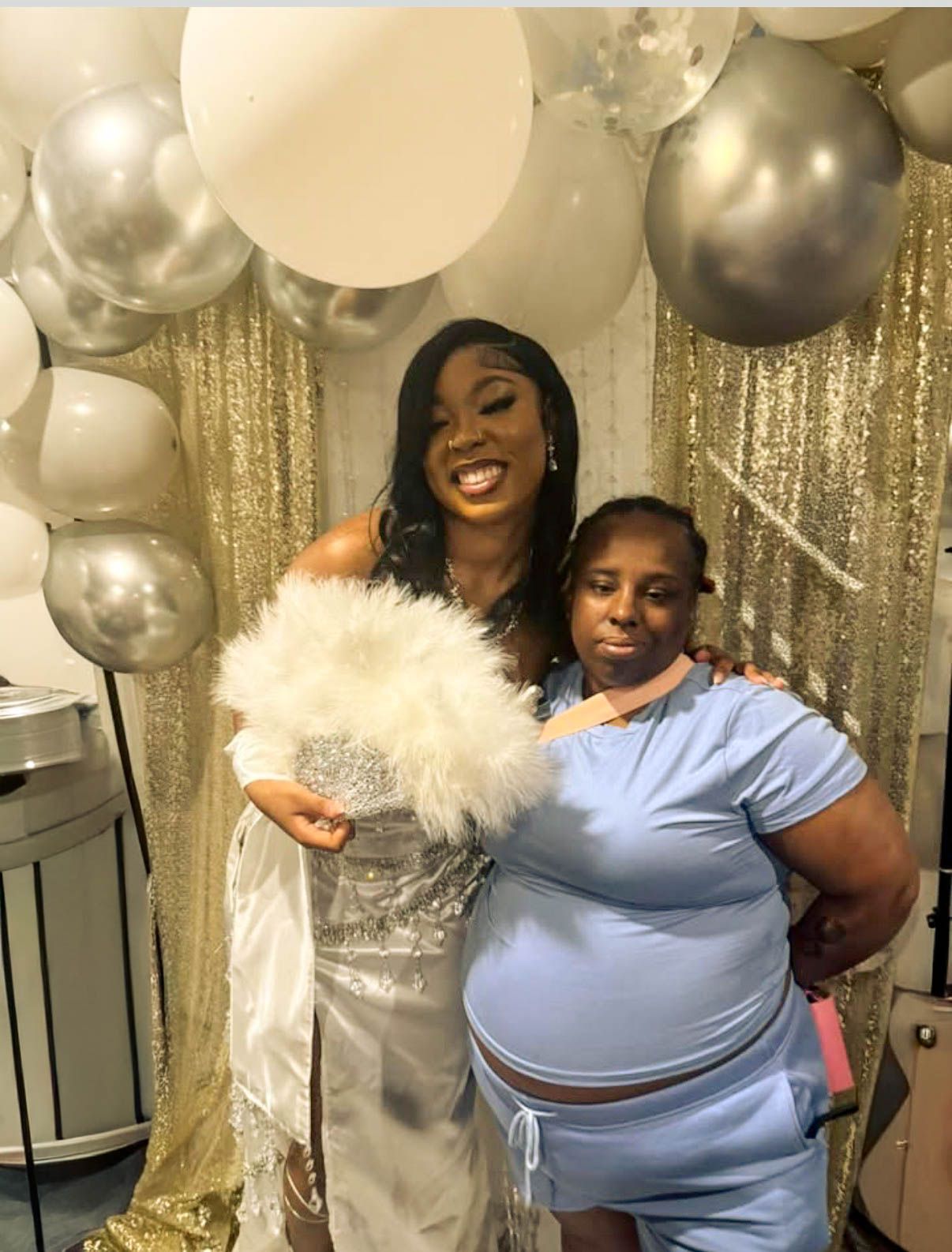 “Golden smiles and shimmering details—capturing a joyful celebration framed in warmth, connection, and unforgettable style.”
