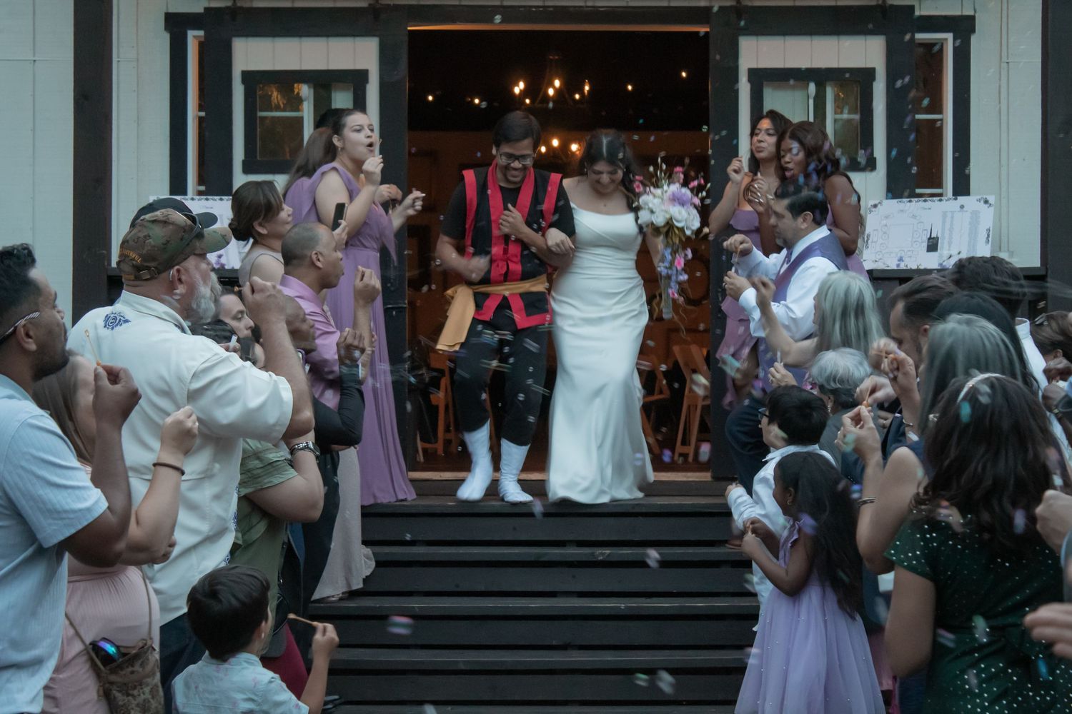 picture of bride and groom exiting wedding reception.