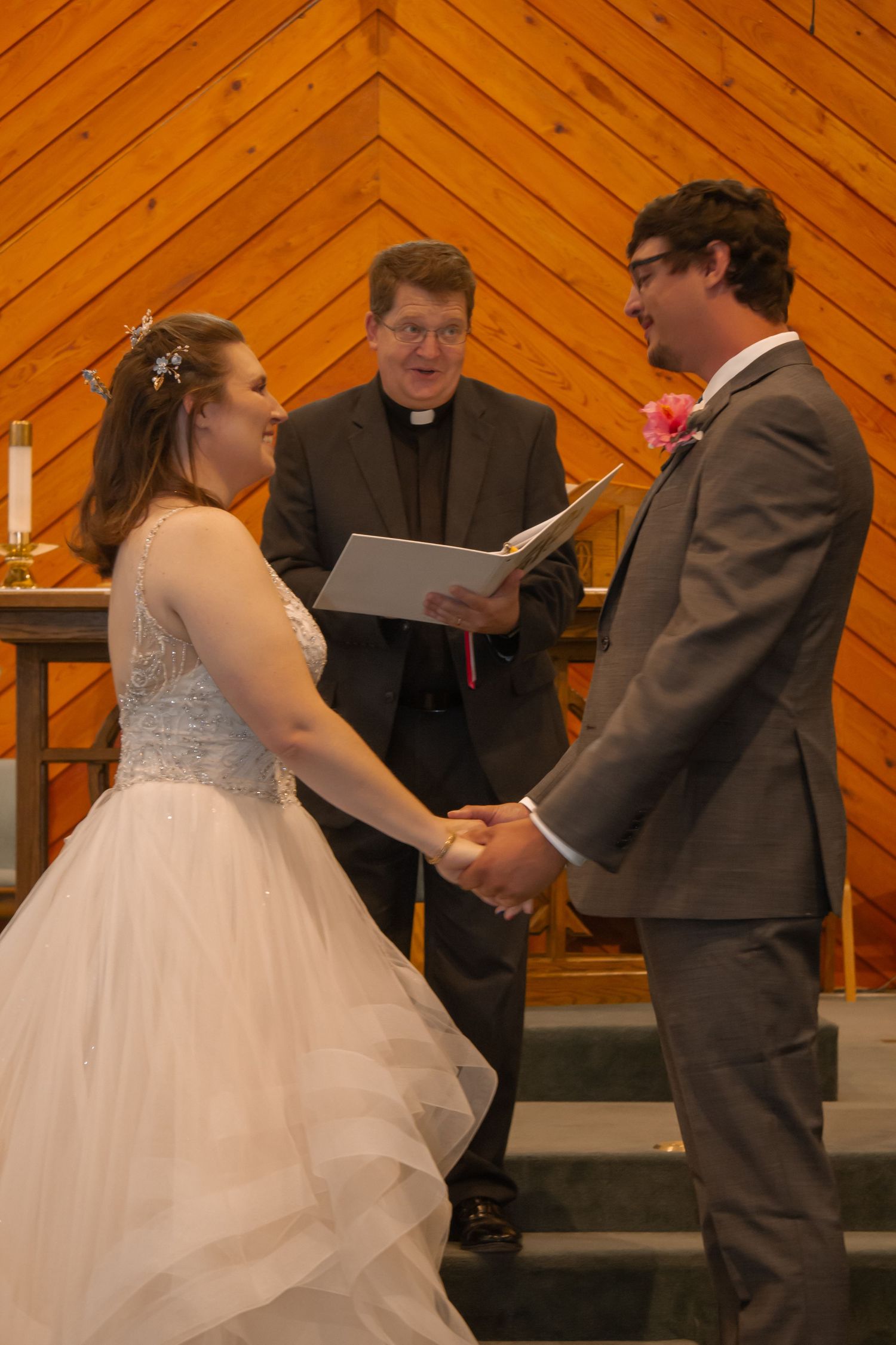picture of bride and groom at wedding ceremony about to say, 