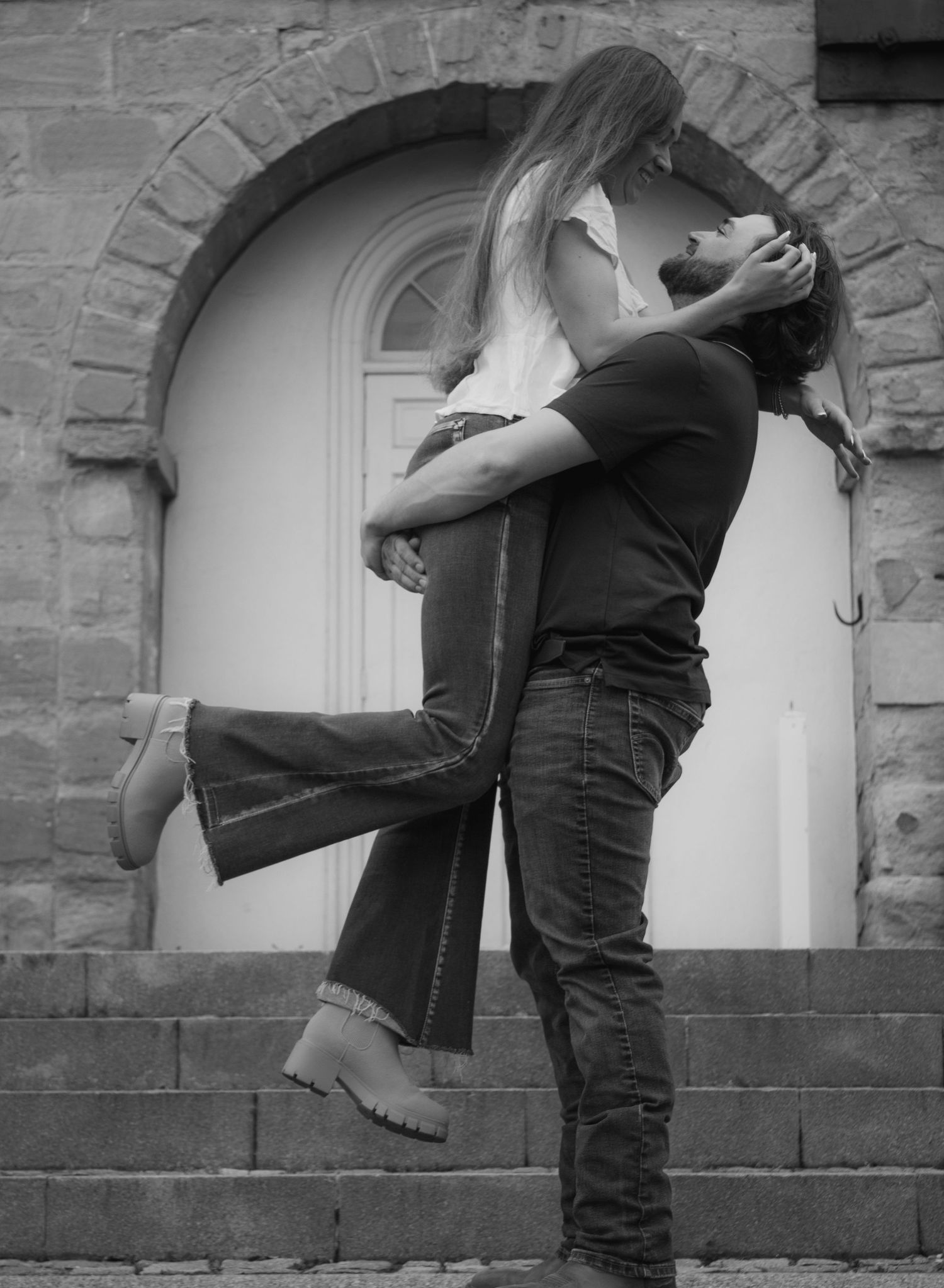 picture of couple, engagement, man lifting up women