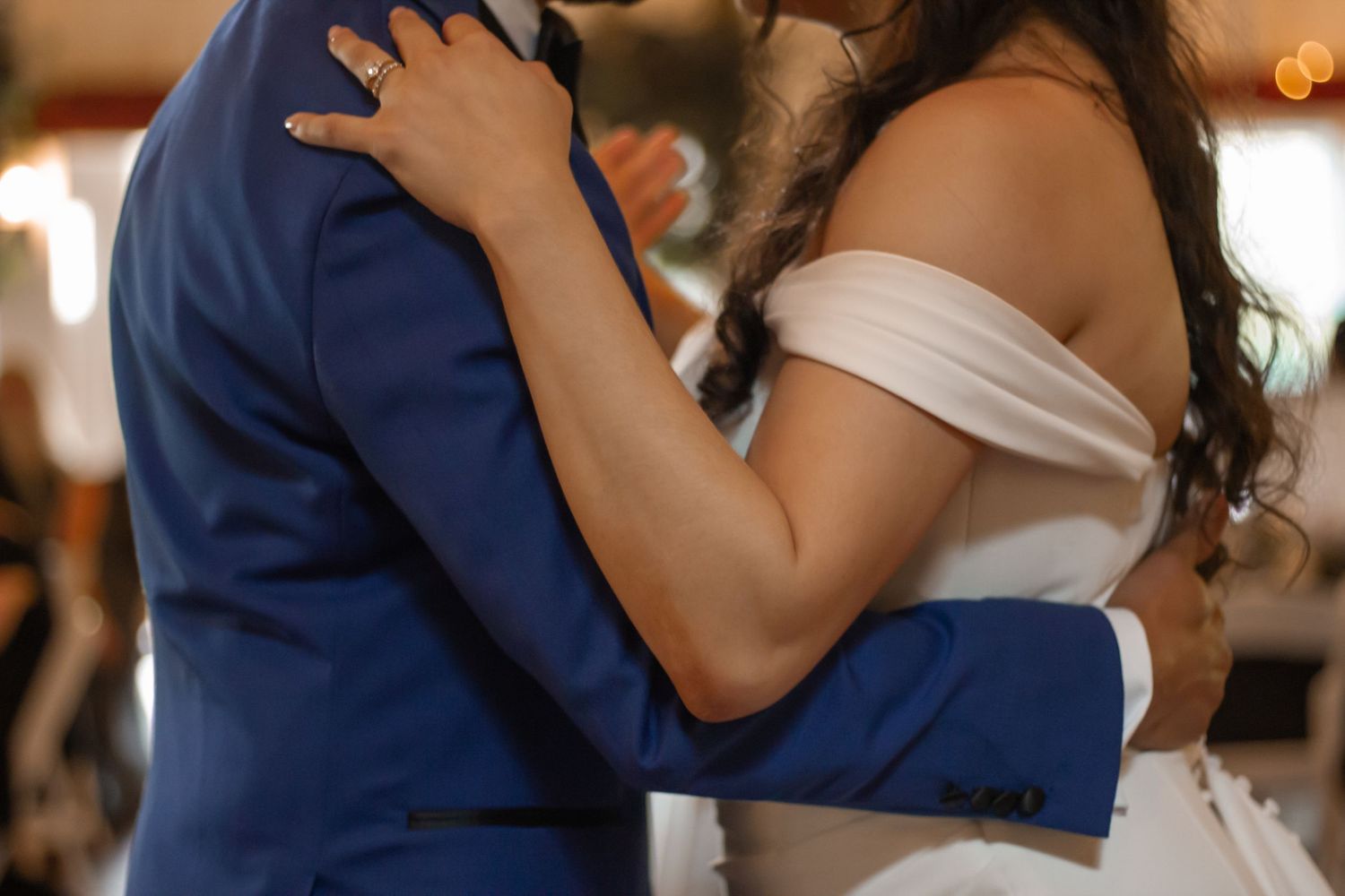 picture of bride and groom dancing and looking at each other