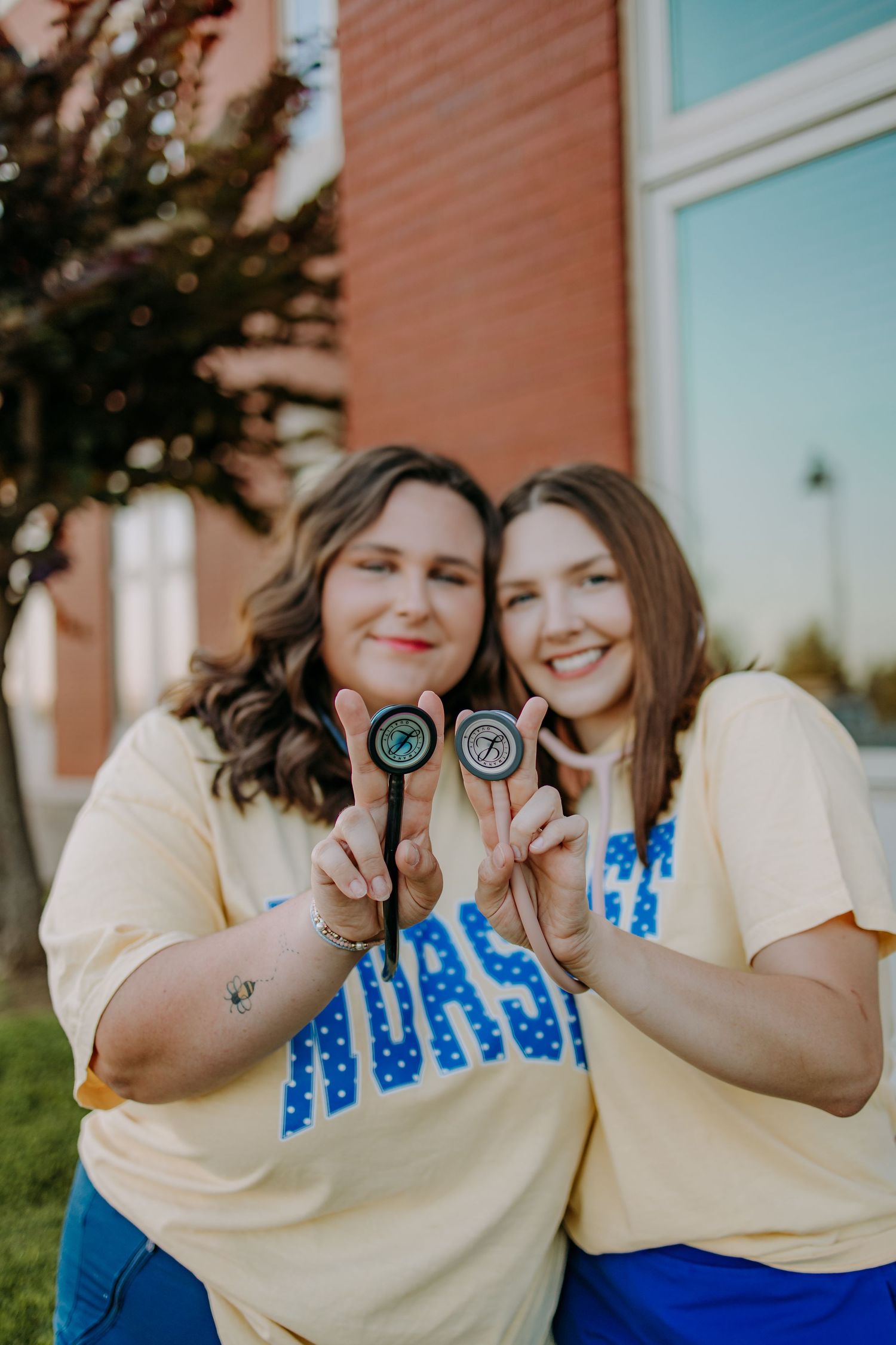Two nursing students in yellow 