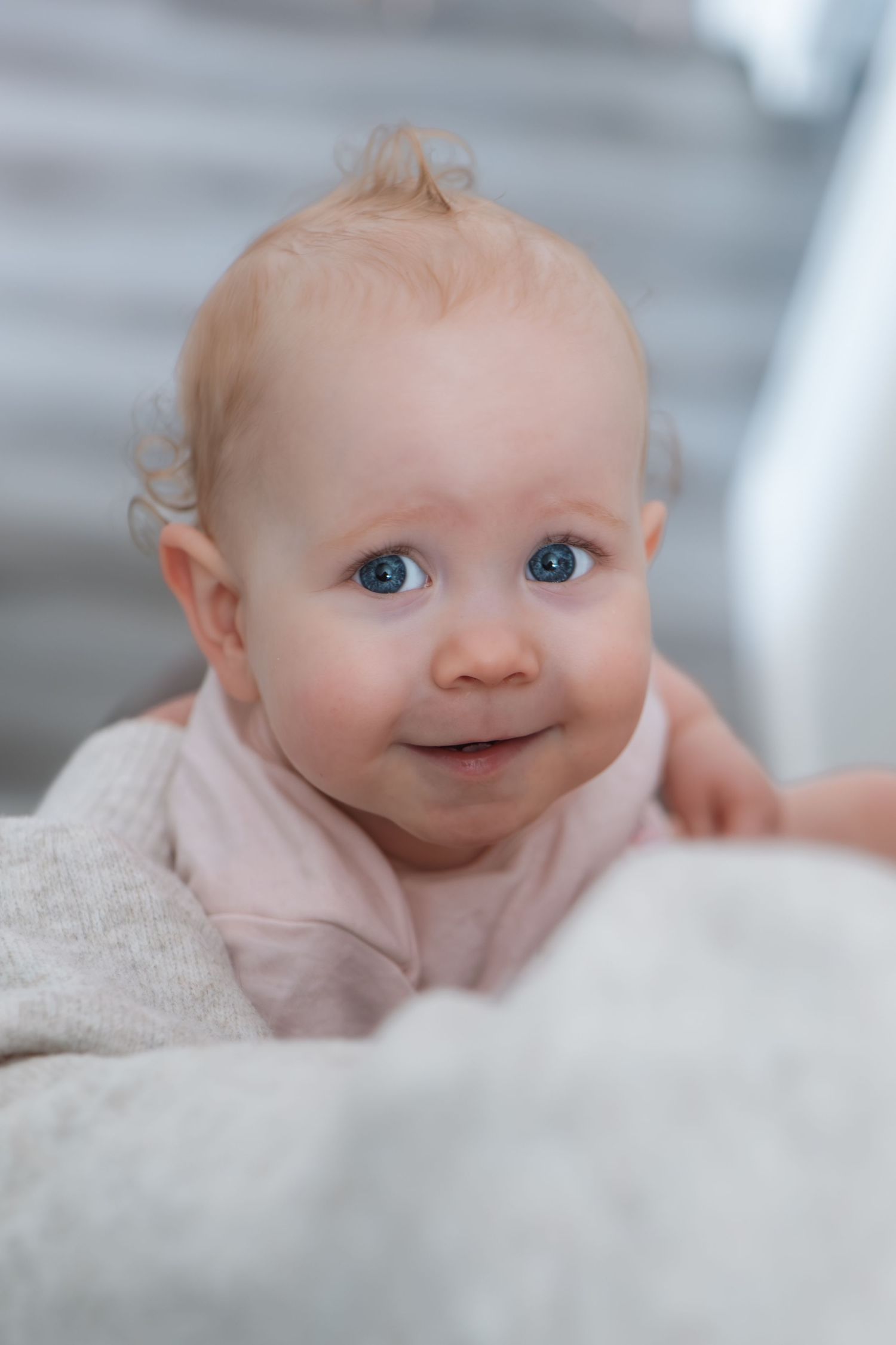 Baby smiling during candid photography session