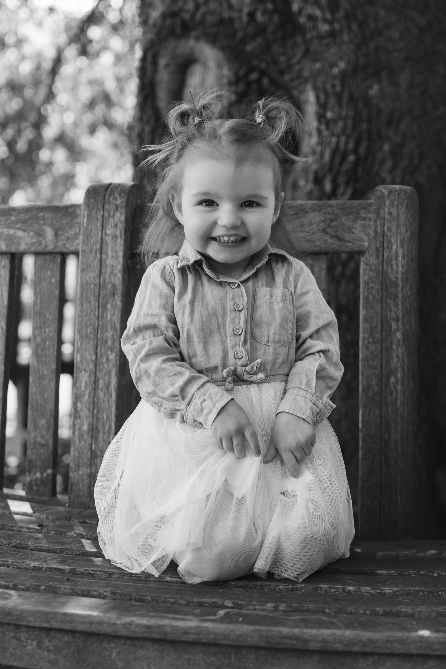 Smiling little girl during outdoor photoshoot inn Dorset, UK