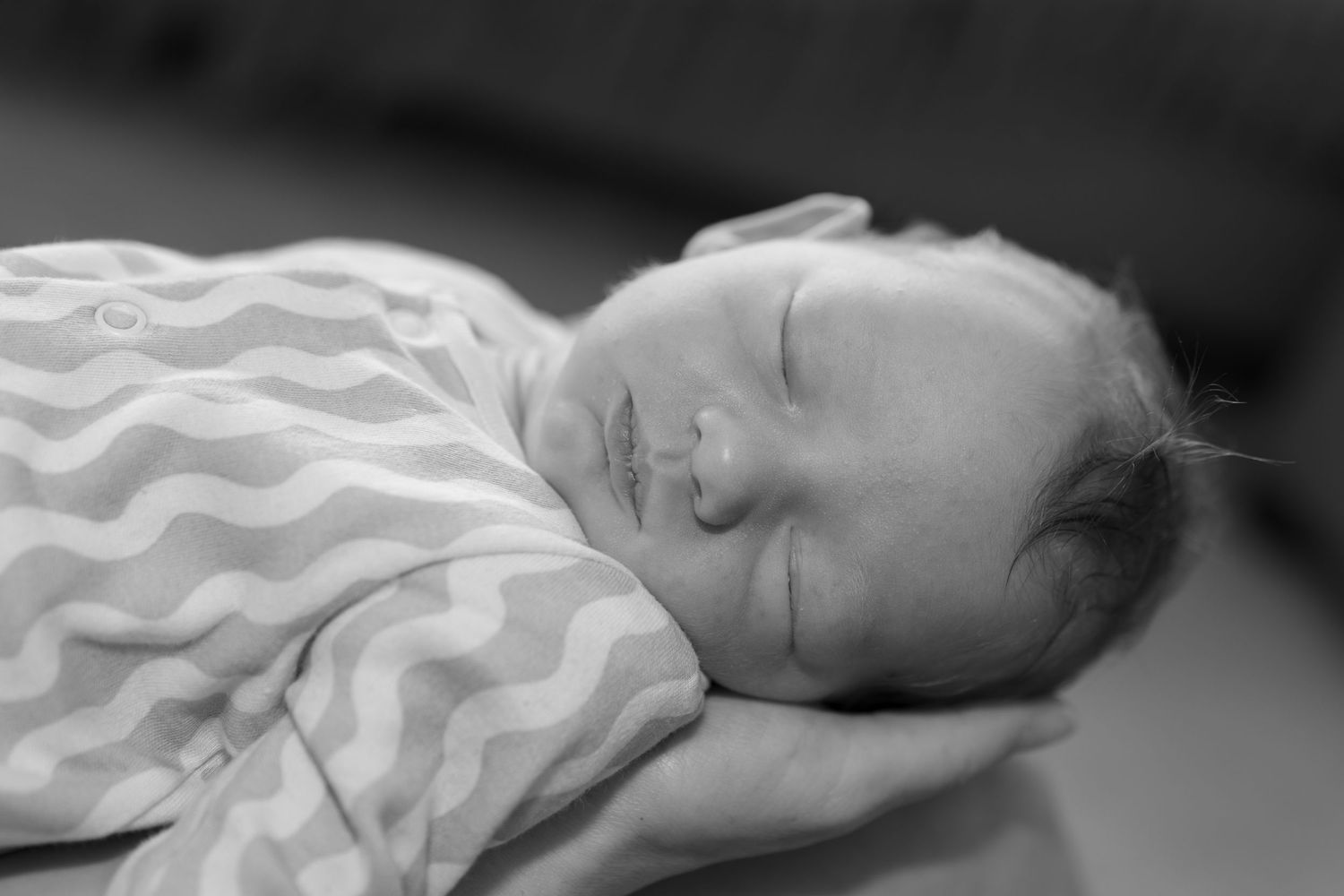 Baby sleeping during lifestyle newborn session