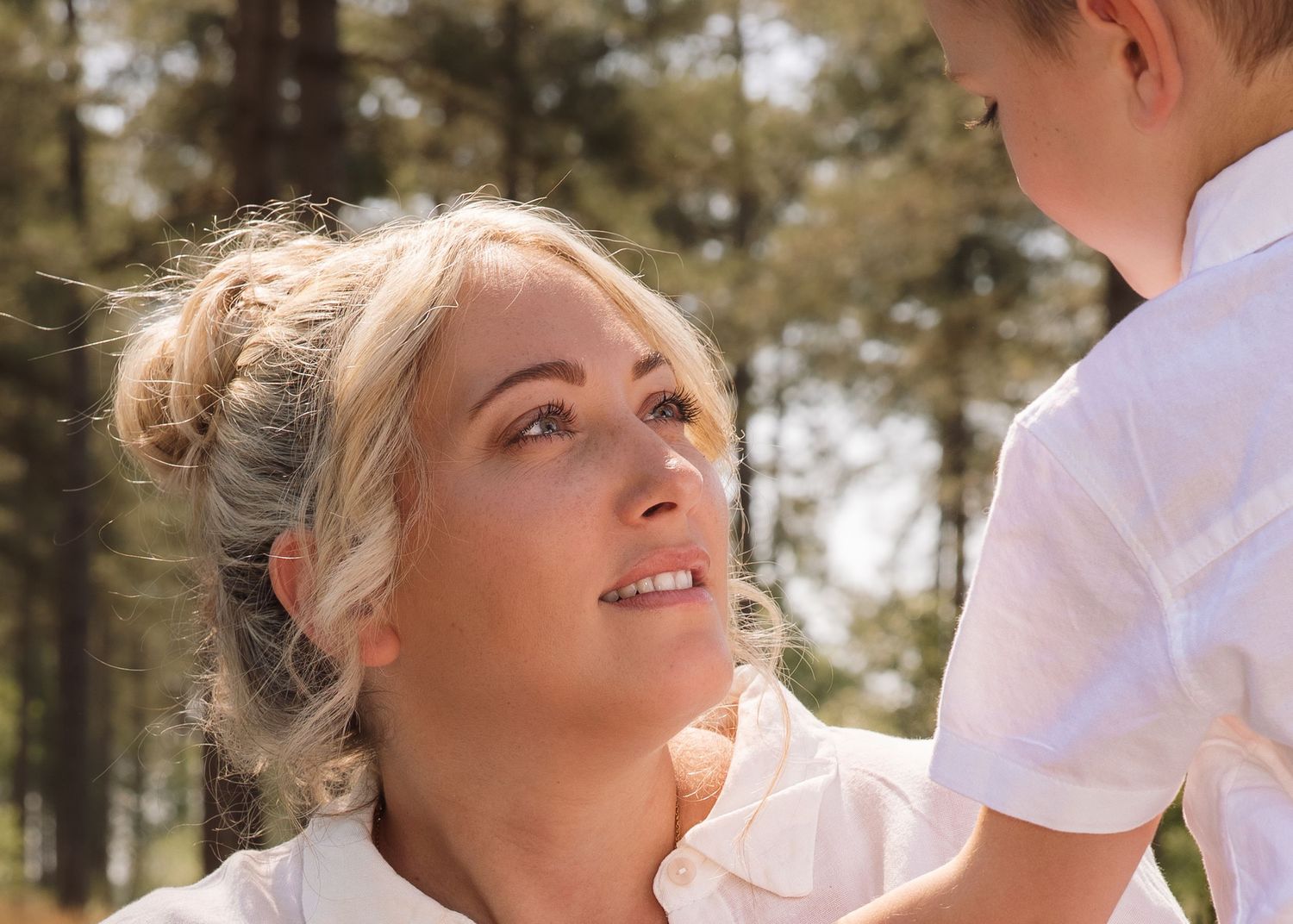Candid photo of a mother looking at her son with love