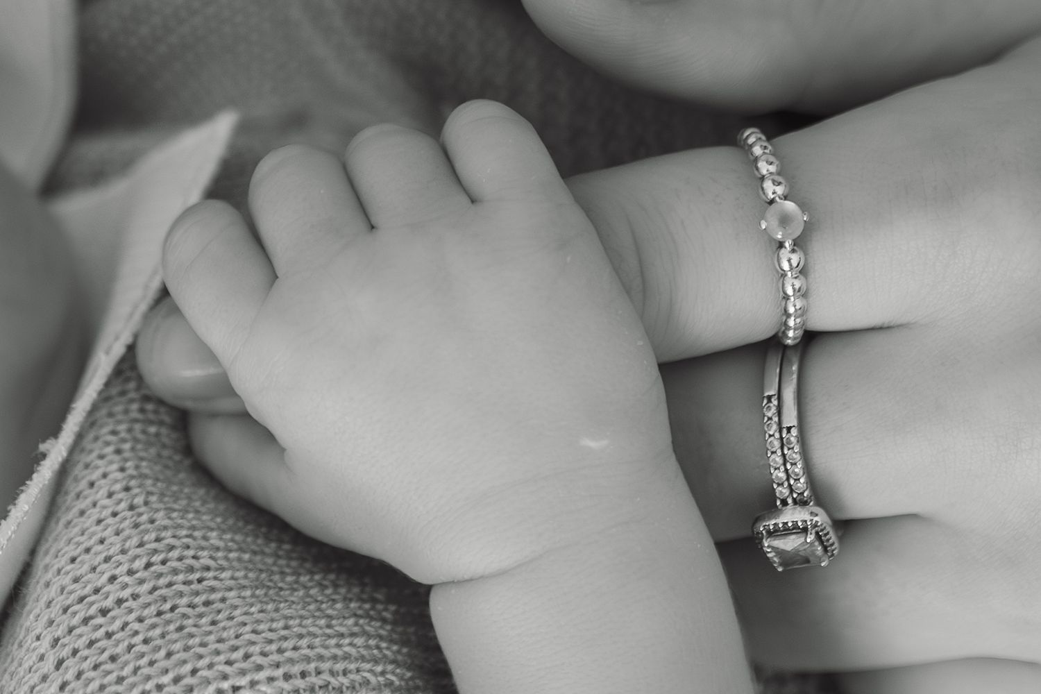 Close up of newborn baby hands and tiny details