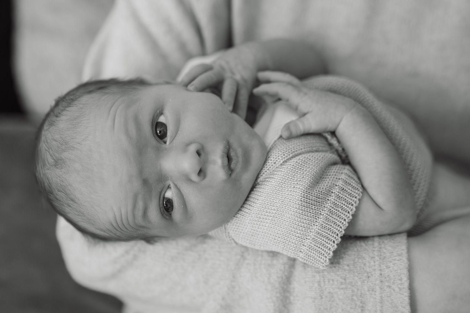 Baby pouting during natural documentary style photography session