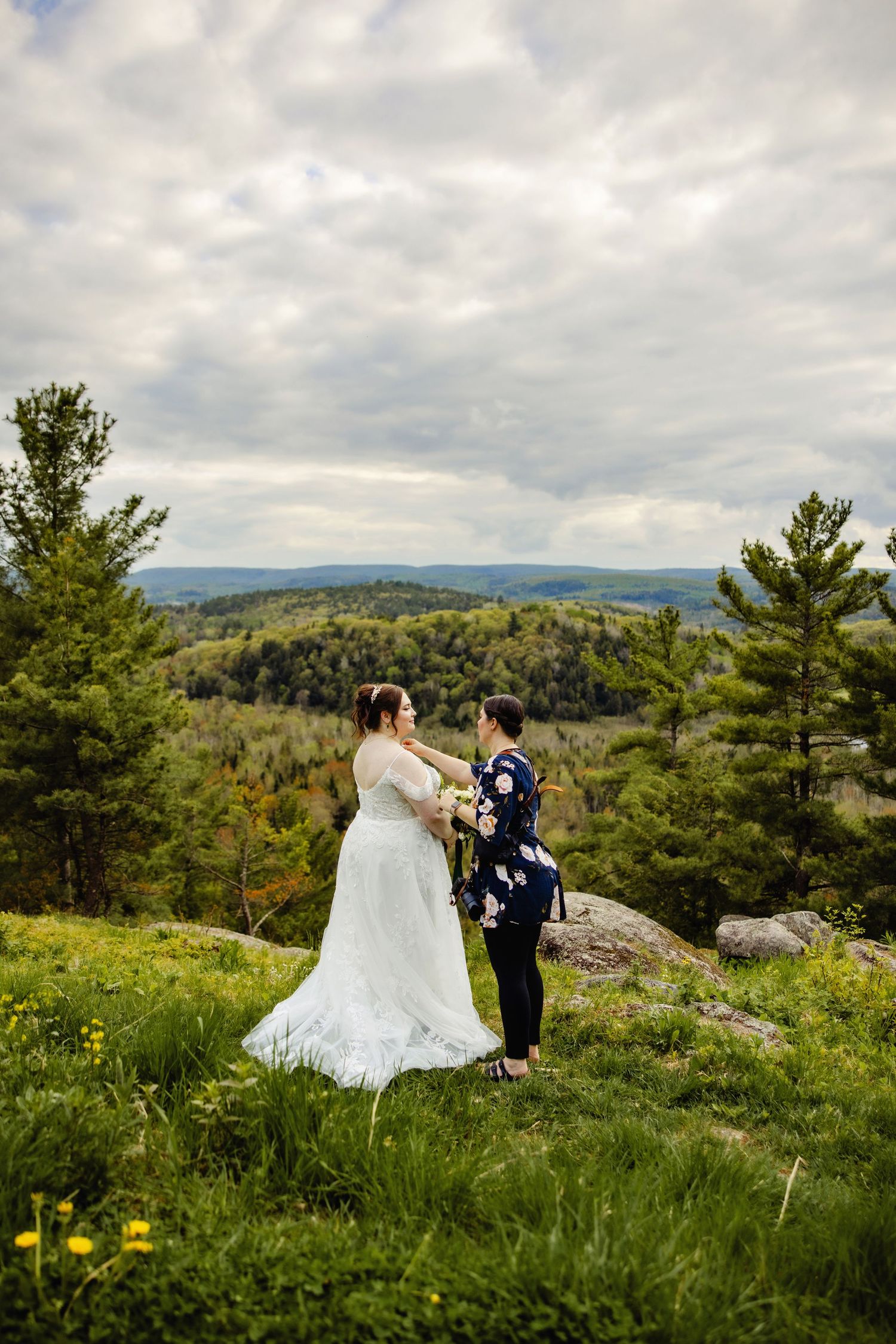 Shauna adjusting a brides jewellery. Ottawa Wedding Photographer and Videographer