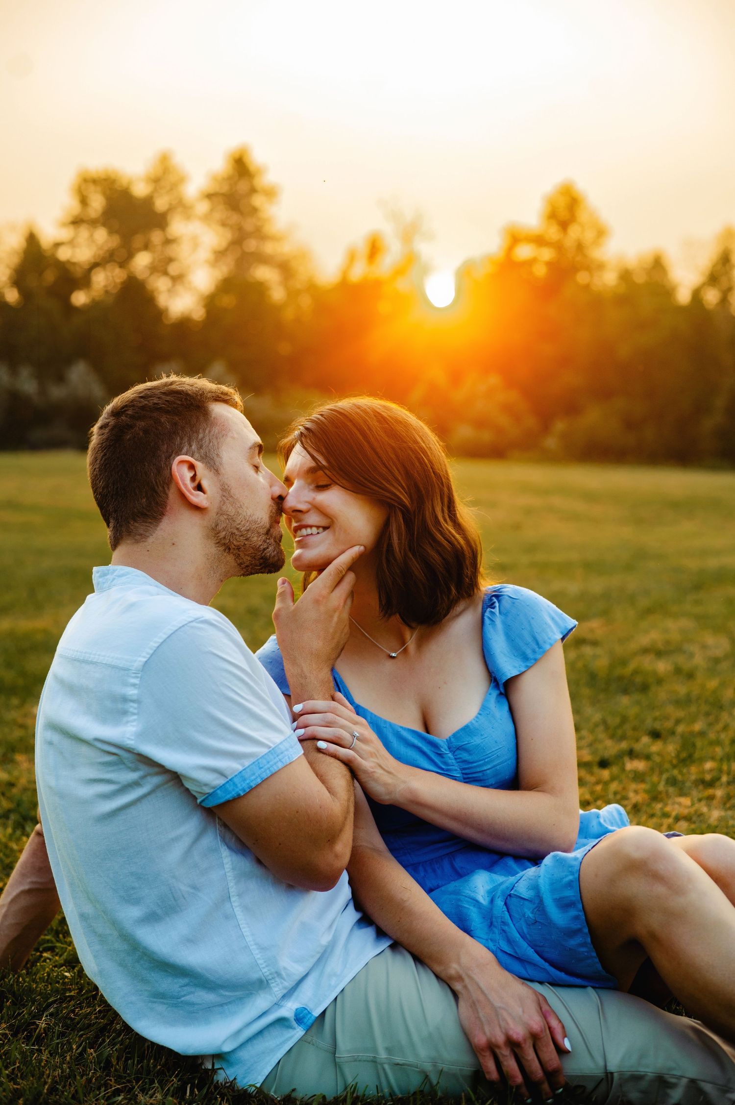 Soon to be husband kissing Fiancés cheek during sunset. Ottawa Wedding Photographer. Ottawa Couples Photographer