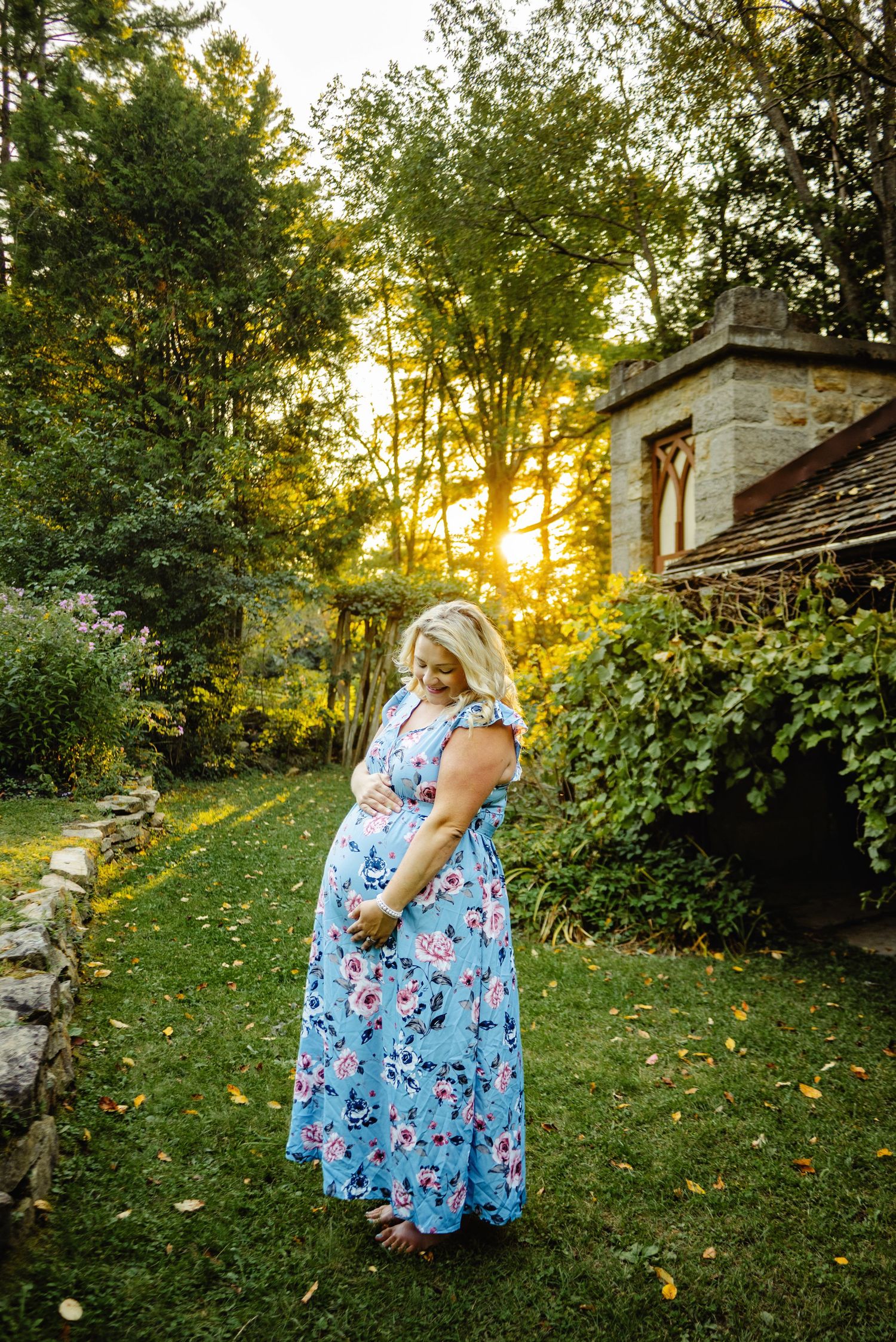 Mom dancing in the sunset holding baby belly. Ottawa Maternity Photography. Ottawa Family Photographer.