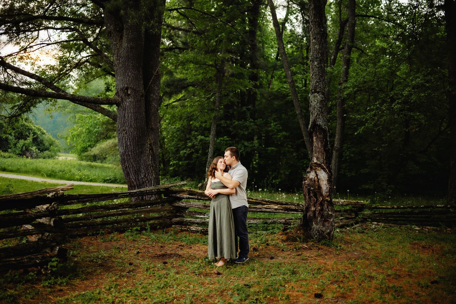 Soon to be husband kissing Fiancés forehead while cuddled. Ottawa Wedding Photographer. Ottawa Couples Photographer