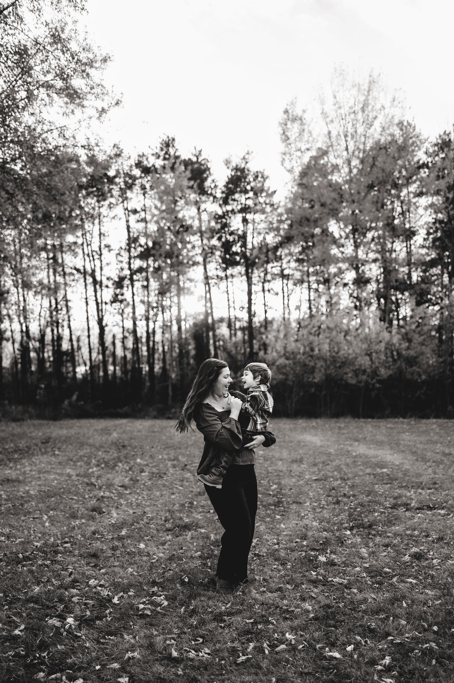 Shauna spinning her son around. Ottawa Family Photographer.