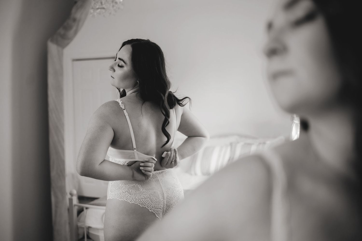 Boudoir fixing bra. Ottawa Boudoir Photographer