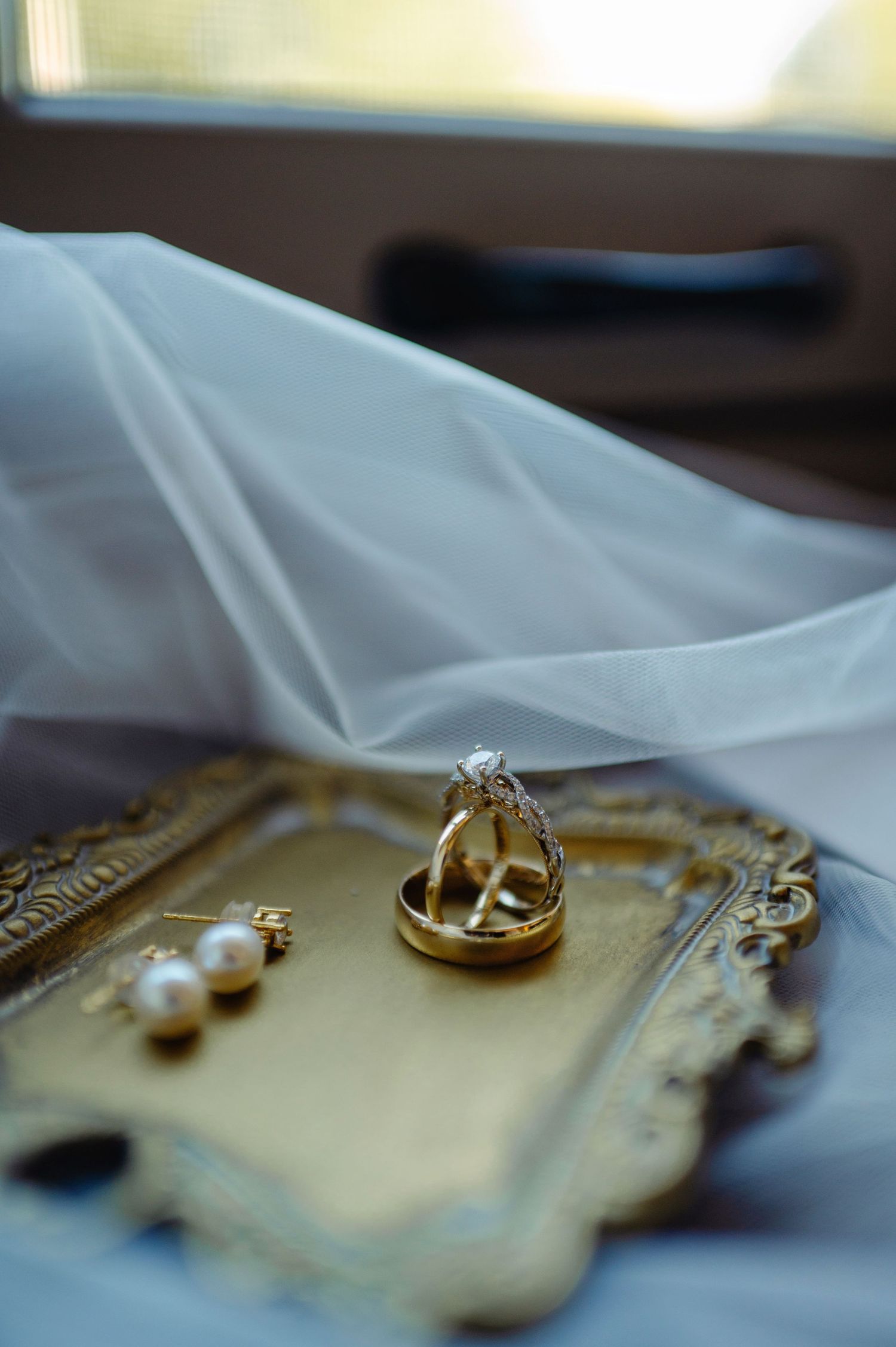 Brides rings and earrings. Ottawa Wedding Photography. Ottawa Wedding Videography.
