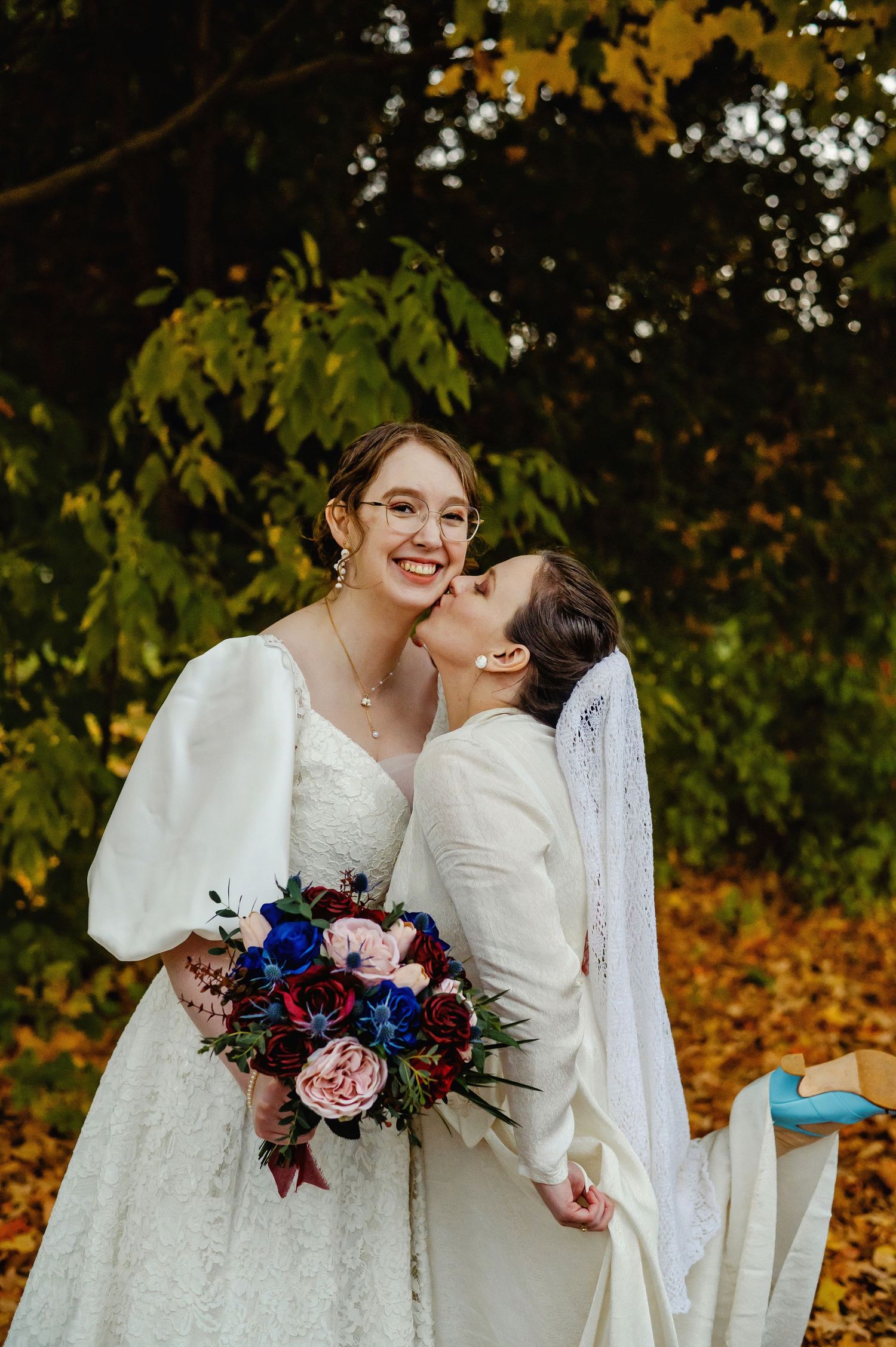Bride kissing their bride. Ottawa Wedding Photographer and Videographer