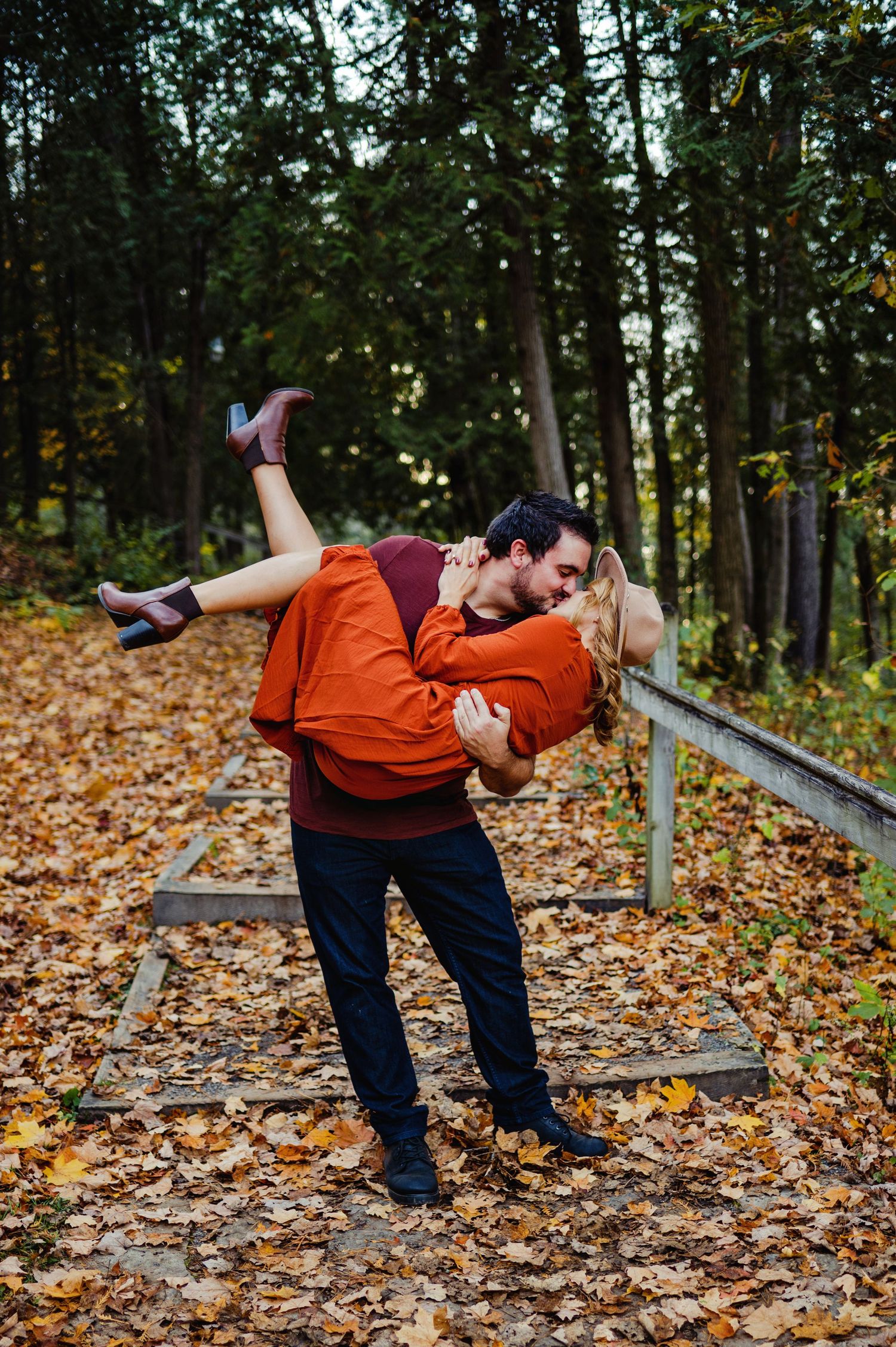 Soon to be husband dipping Fiancé while kissing. Ottawa Wedding Photographer. Ottawa Couples Photographer