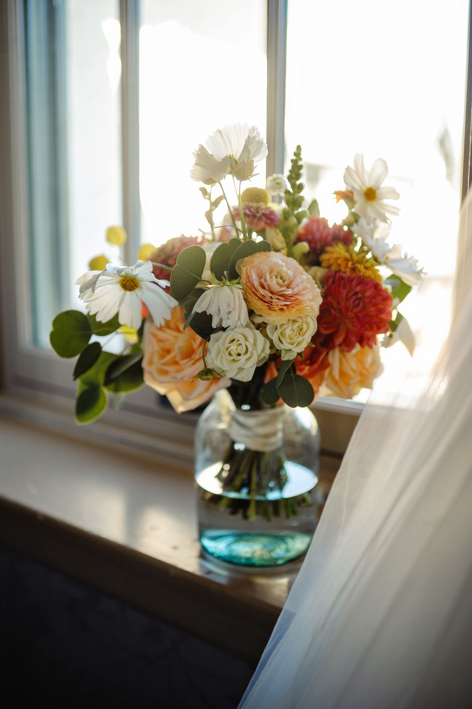 Brides flowers sitting by the window. Ottawa Wedding Photography. Ottawa Wedding Videography.