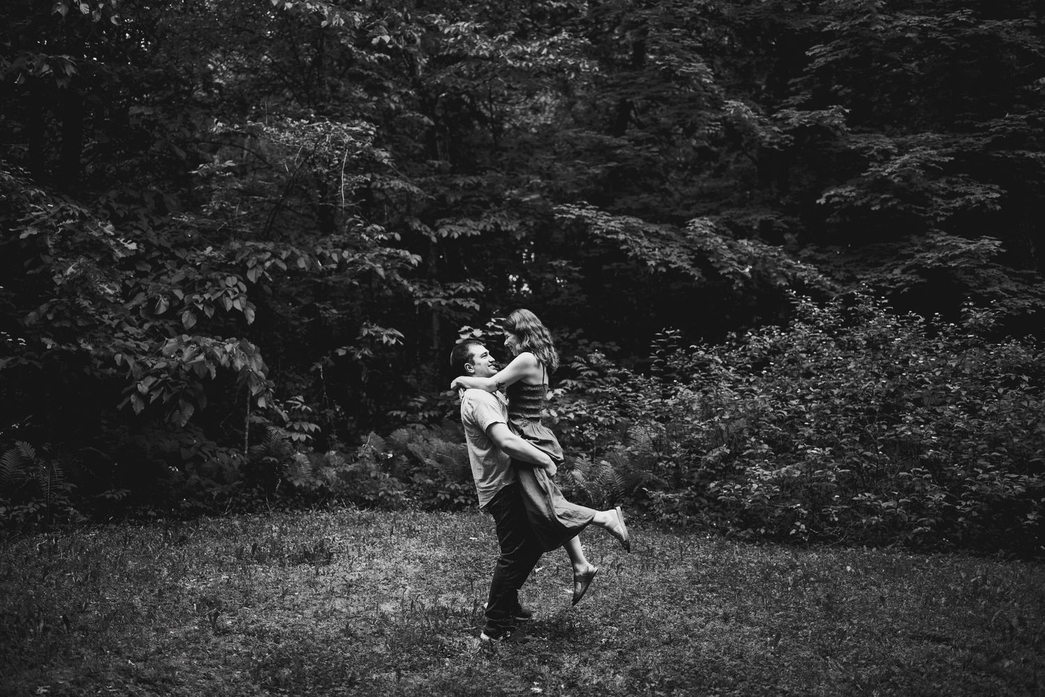 Fiancé spinning future bride around. Ottawa Wedding Photographer. Ottawa Couples Photographer.