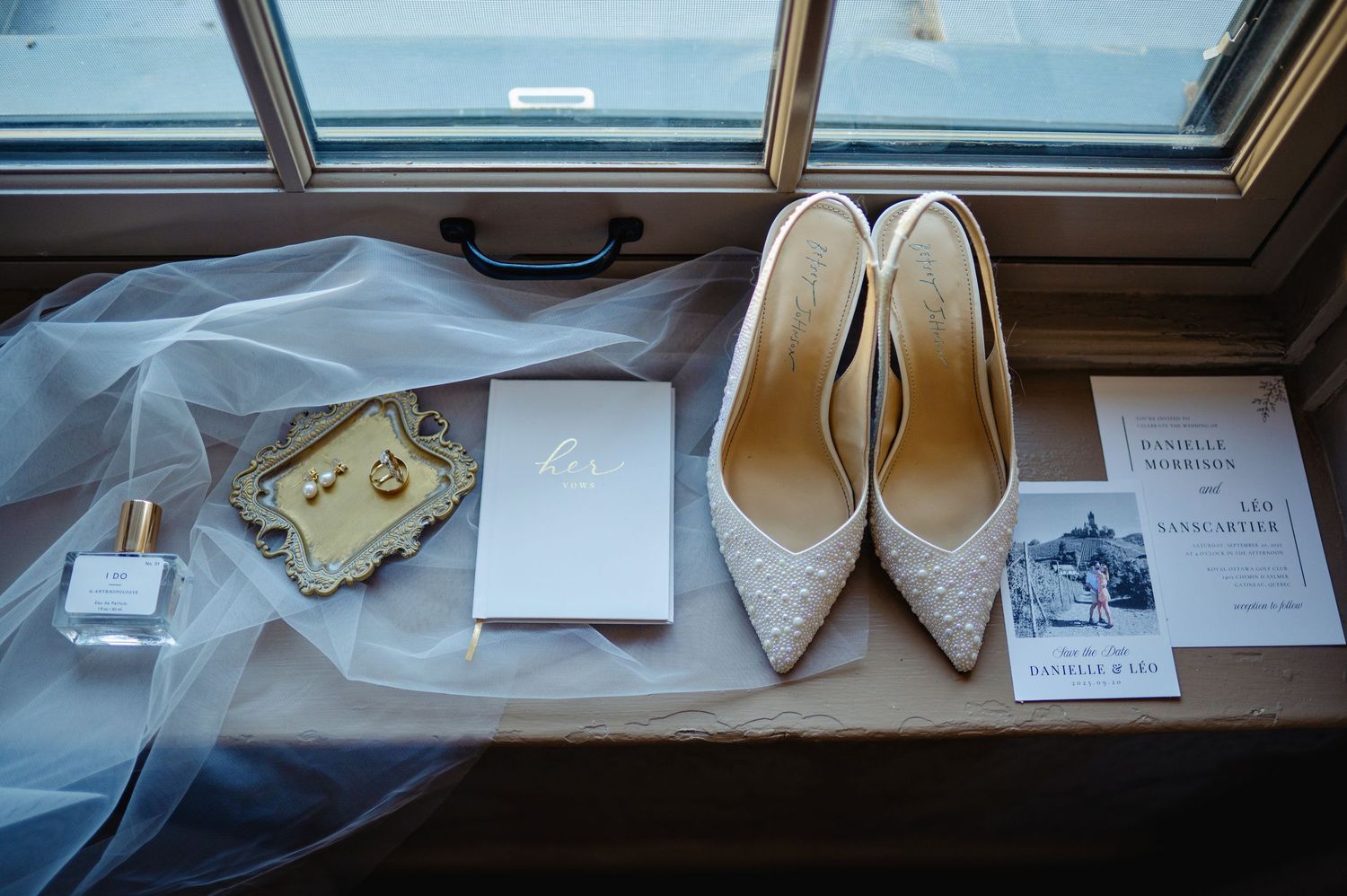 Brides shoes, vows, rings, earrings, perfume, veil and invites. Ottawa Wedding Photography. Ottawa Wedding Videography.