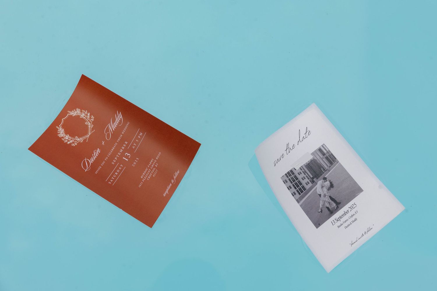 Wedding invitation cards arranged in a pool