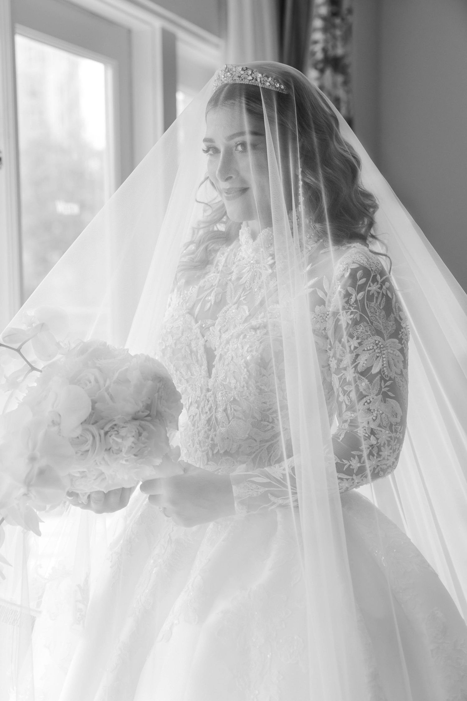 black and white bride portrait under her veil