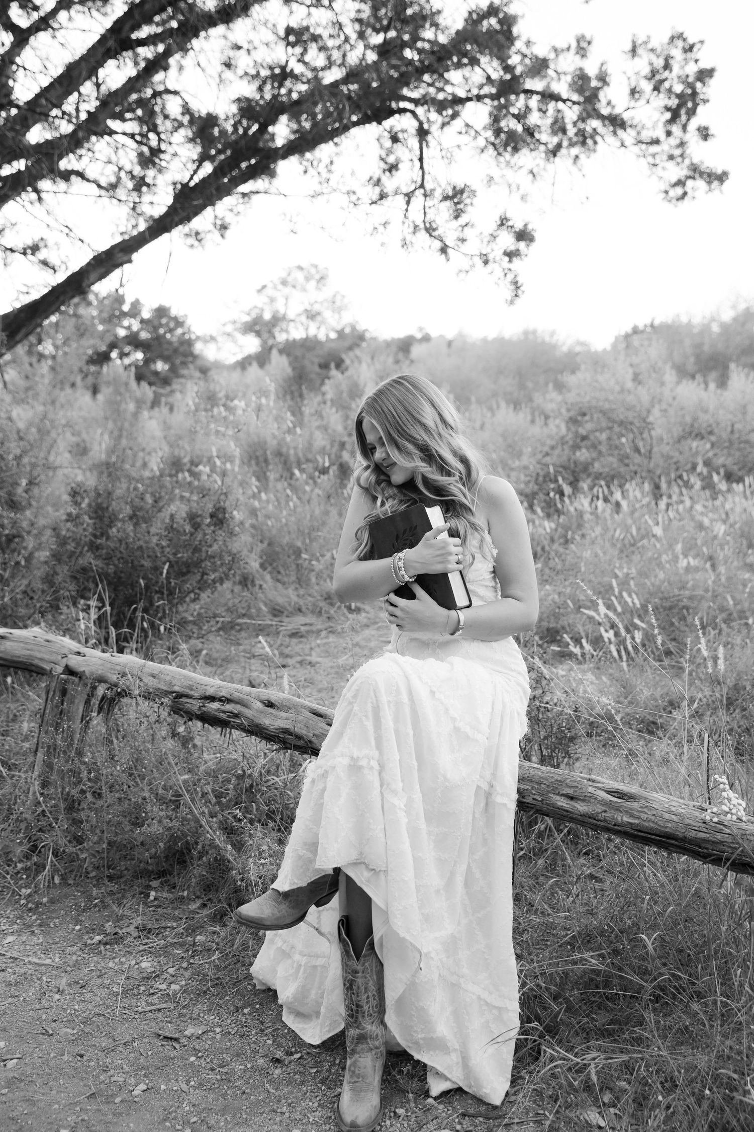 senior portraits outdoors holding bible