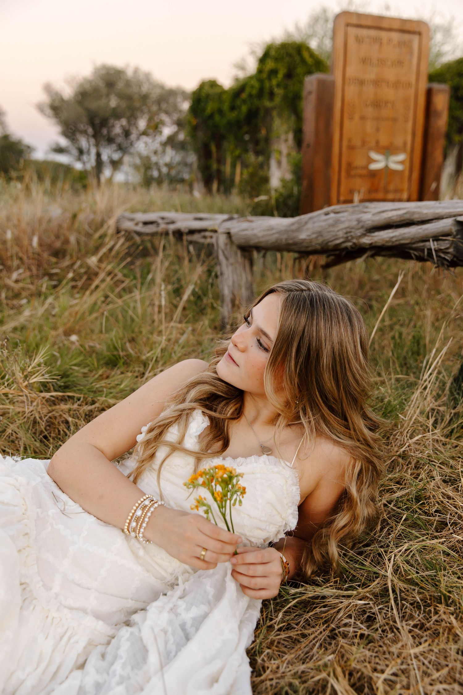 senior portraits outside wheat grass