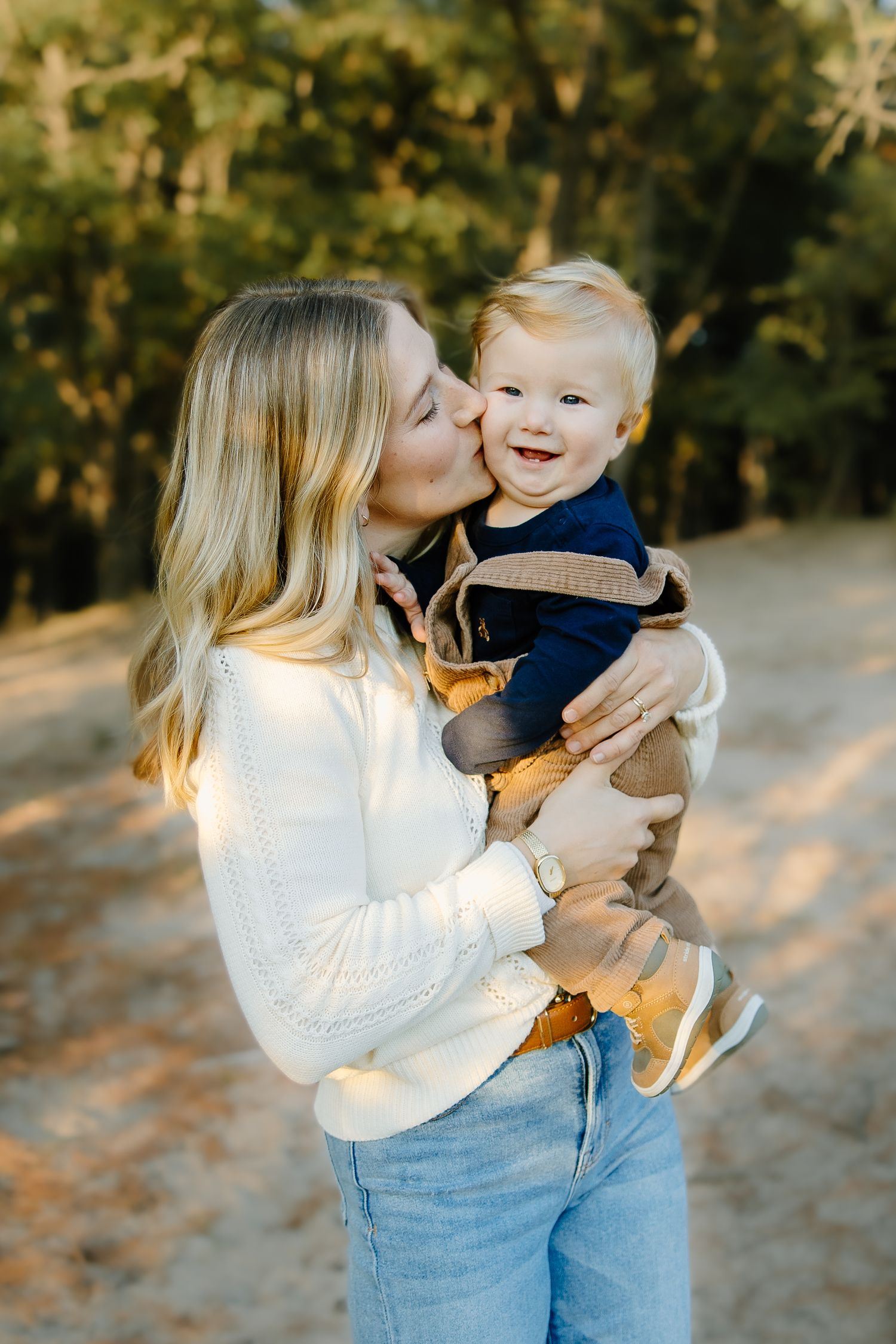 Heartwarming family moments captured during outdoor autumn photoshoot.
