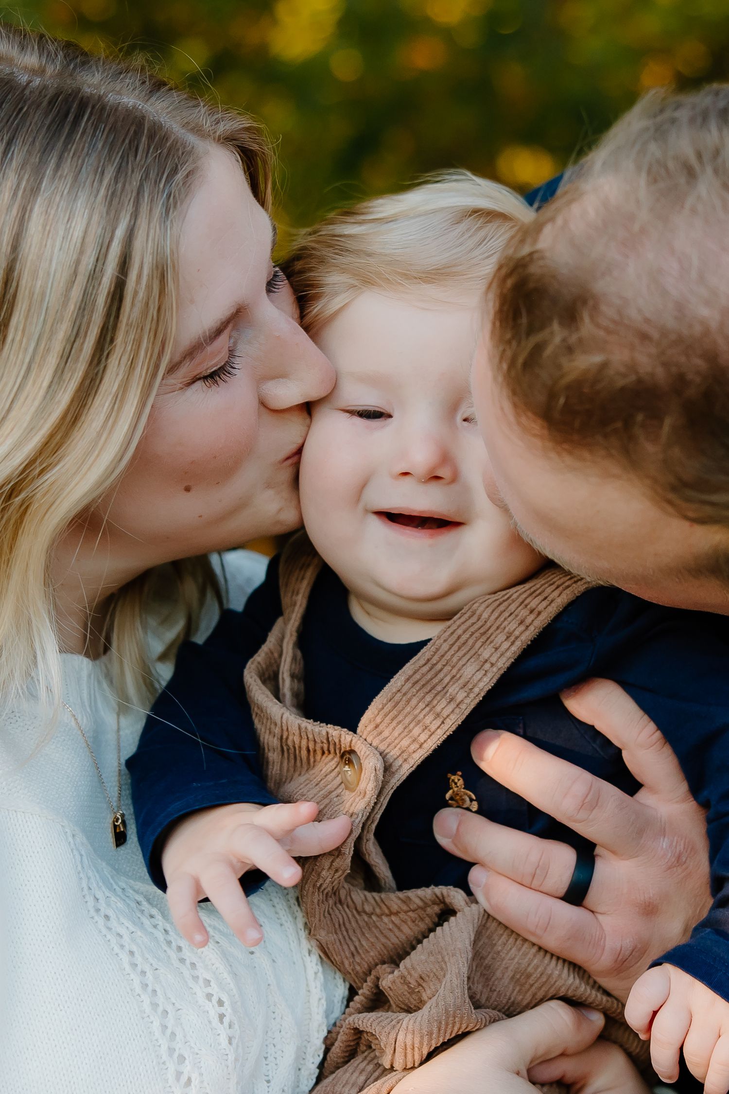Sweet family moments captured during golden hour photography session.
