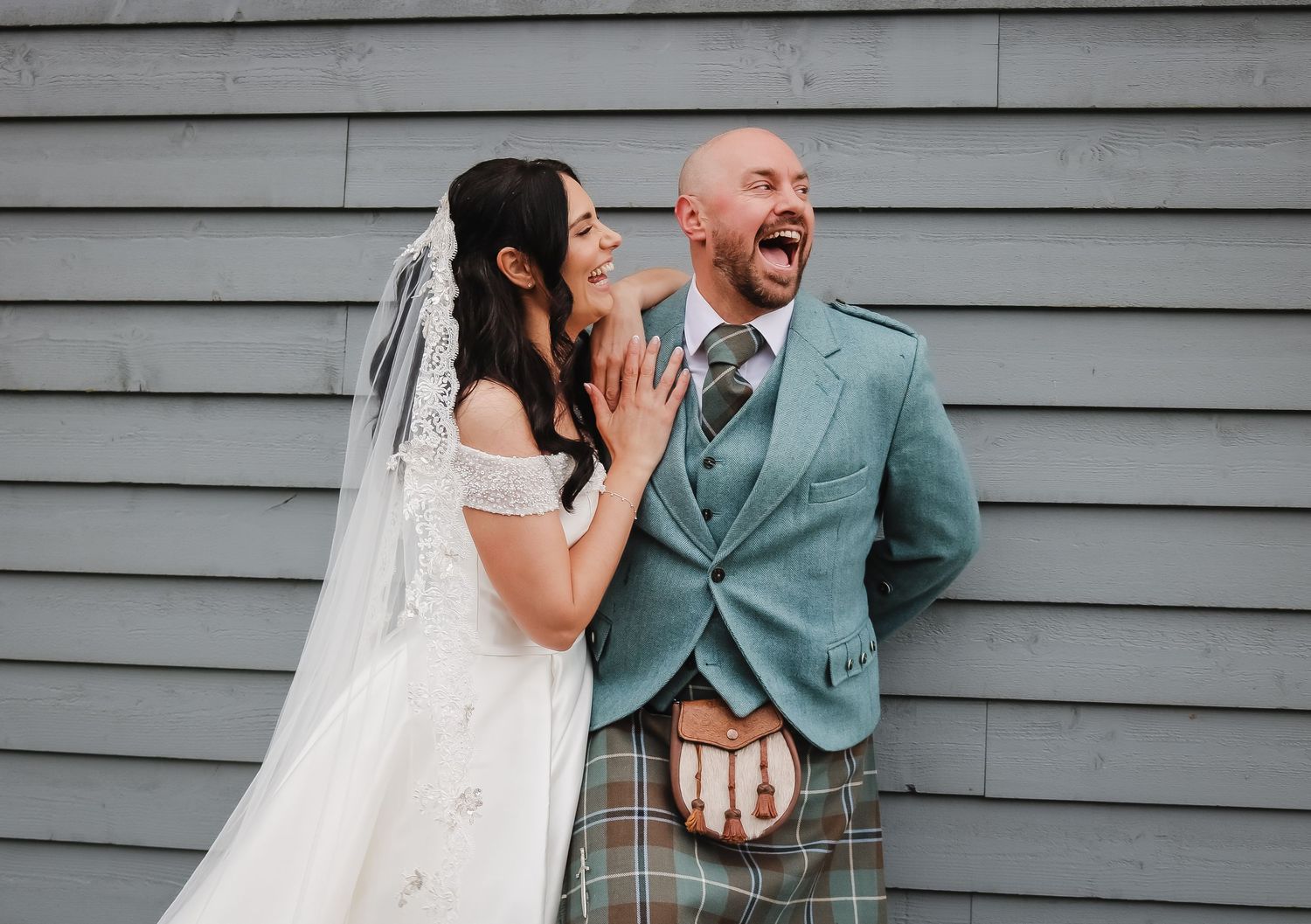 A sequence of wedding photos showing a couple sharing joyful reactions against a gray wall background.