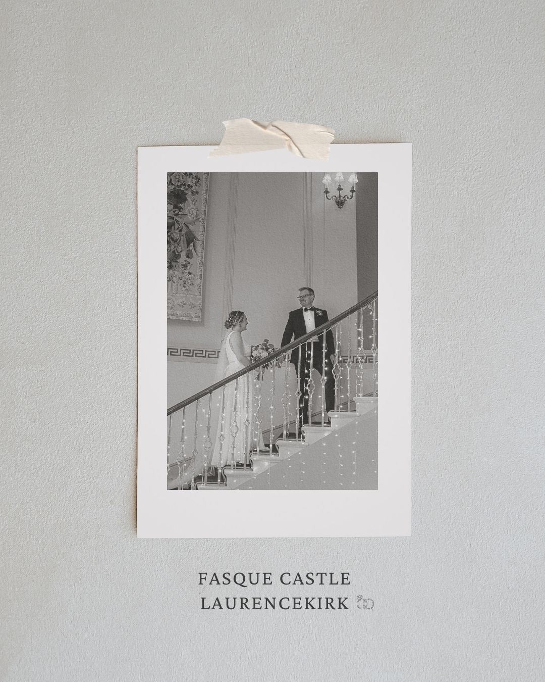 Black and white photographs displayed on a light gray wall show interior staircase scenes from Fasque Castle.