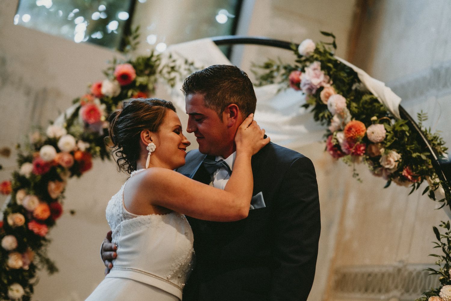 Romantic wedding moments captured in a series of intimate photographs with floral decorations.