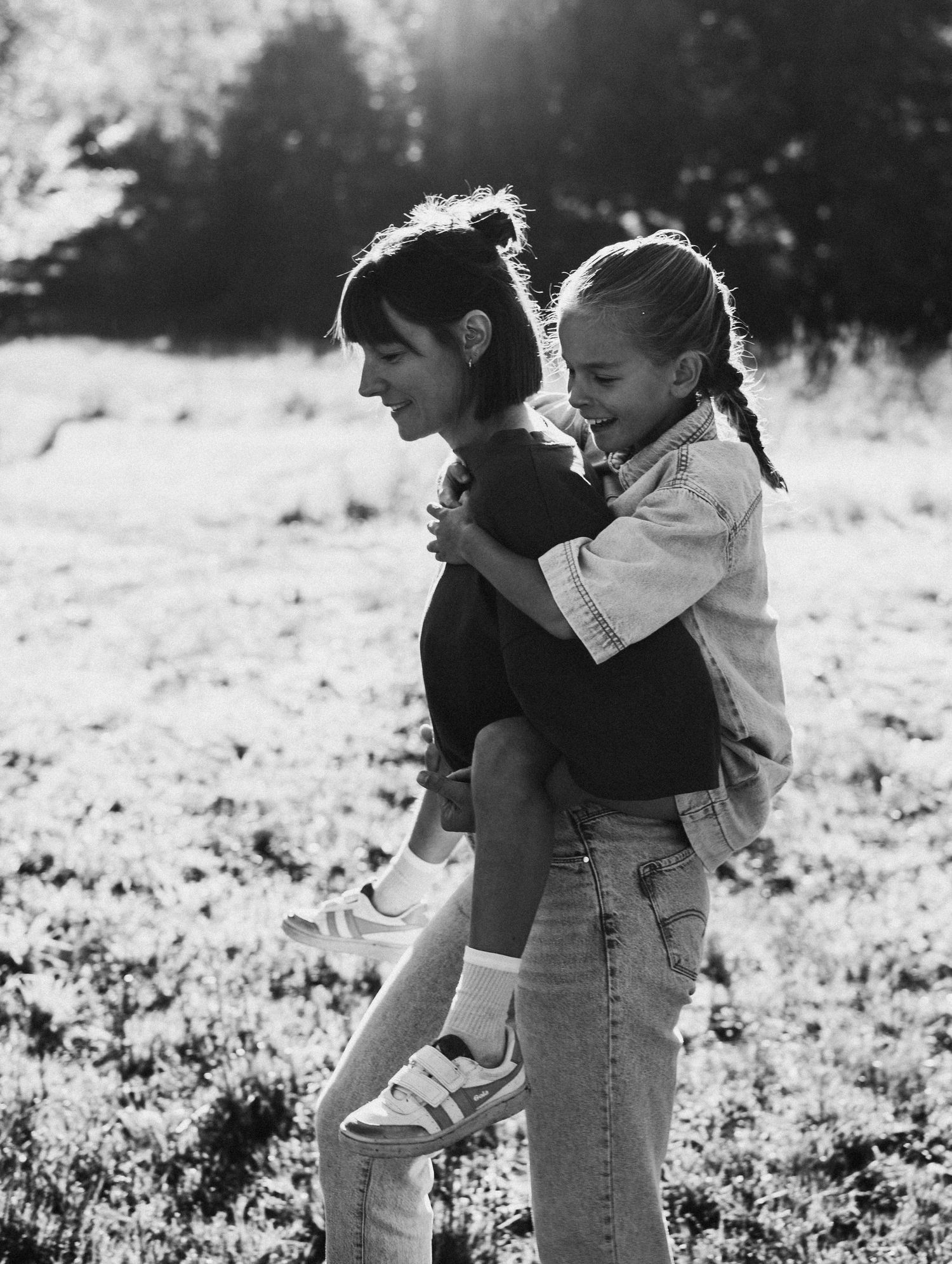 Series of candid moments captured in a sunny field with natural interactions.