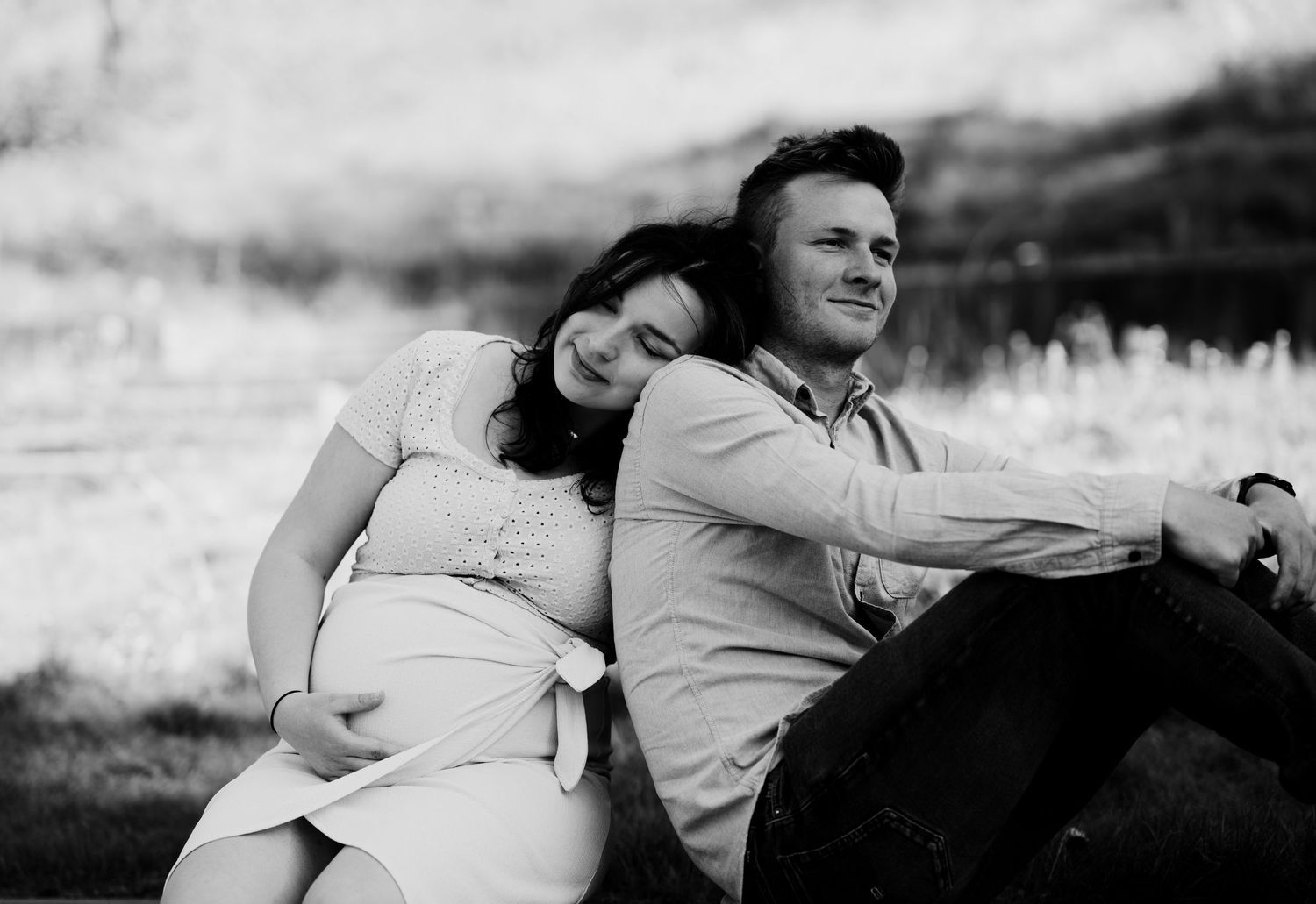 Intimate black and white photo series showing tender moments outdoors.
