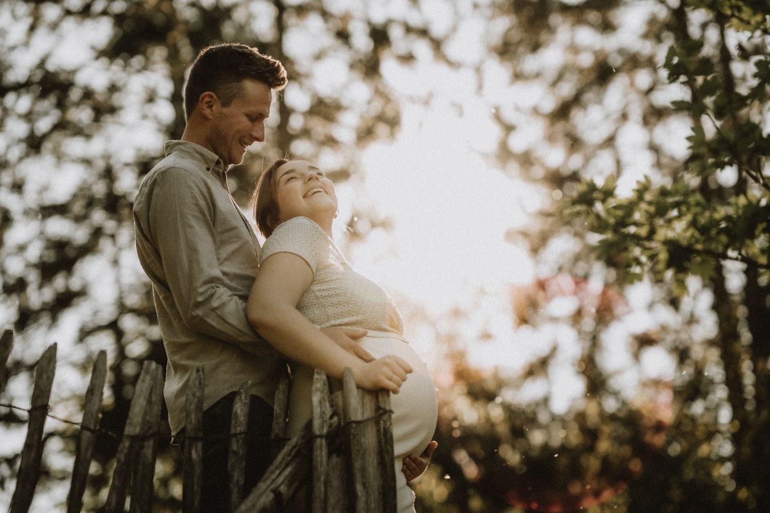 Golden hour photography series capturing intimate moments in a wooded setting.