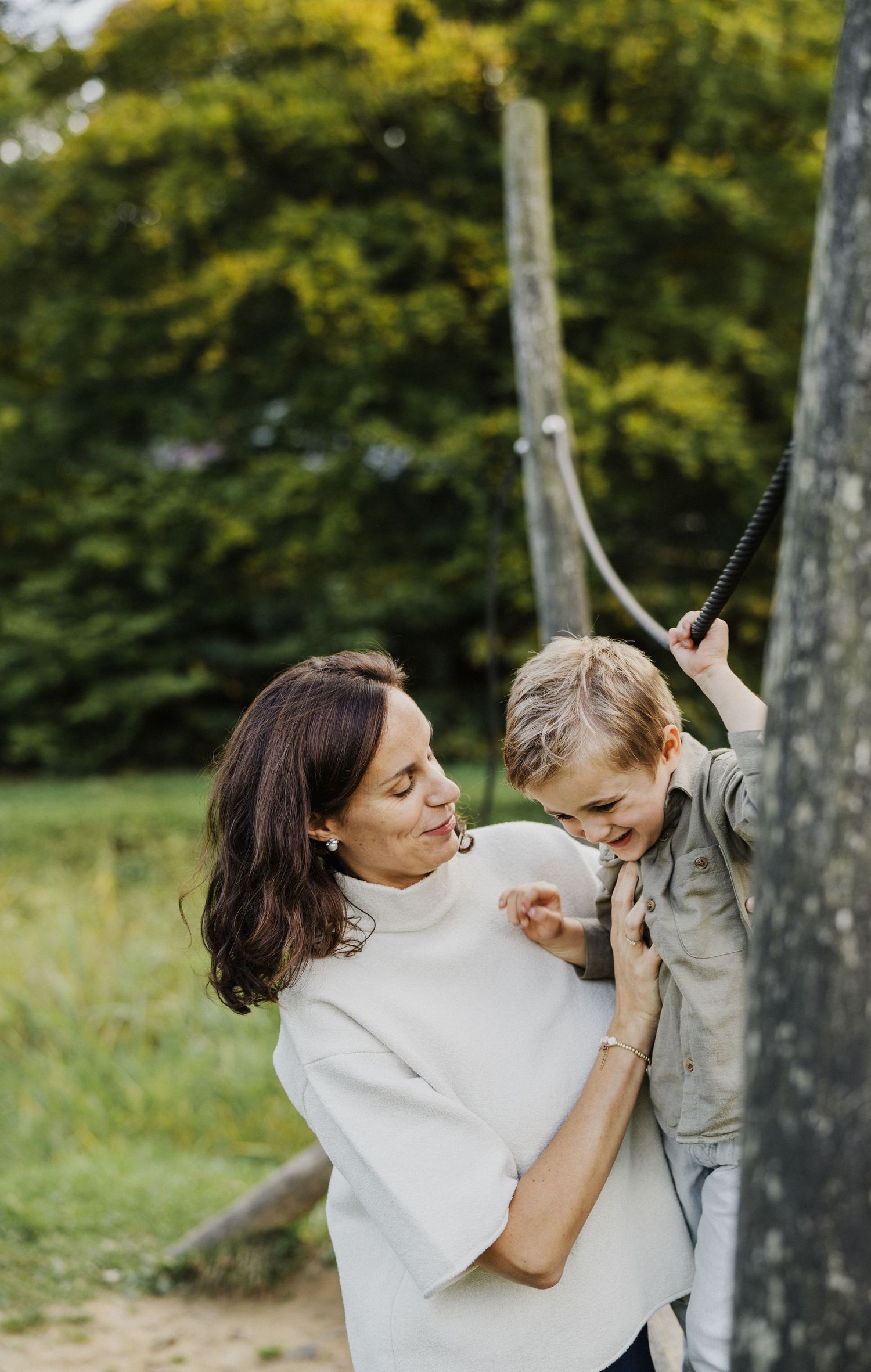 Playful outdoor photo sequence showing joyful interactions in natural lighting.