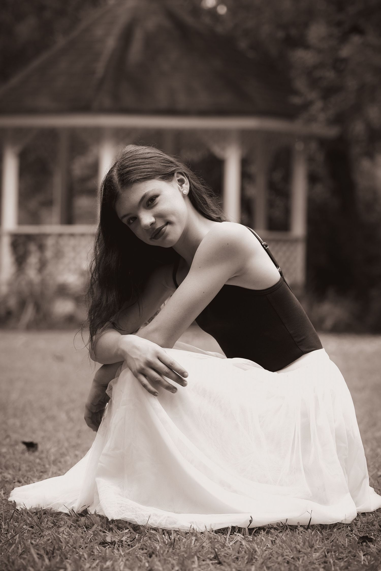 Dreamy black and white photo series showing graceful poses on grass.